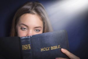 1200-507801980-girl-reading-bible-1536427989774-300x200.jpg