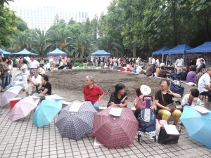 Umbrellas_at_marriage_market_Shanghai-300x225.jpg