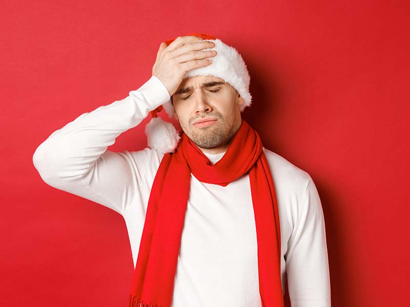 35-benzoix-concept-christmas-winter-holidays-celebration-portrait-sad-frustrated-man-santa-hat.jpg