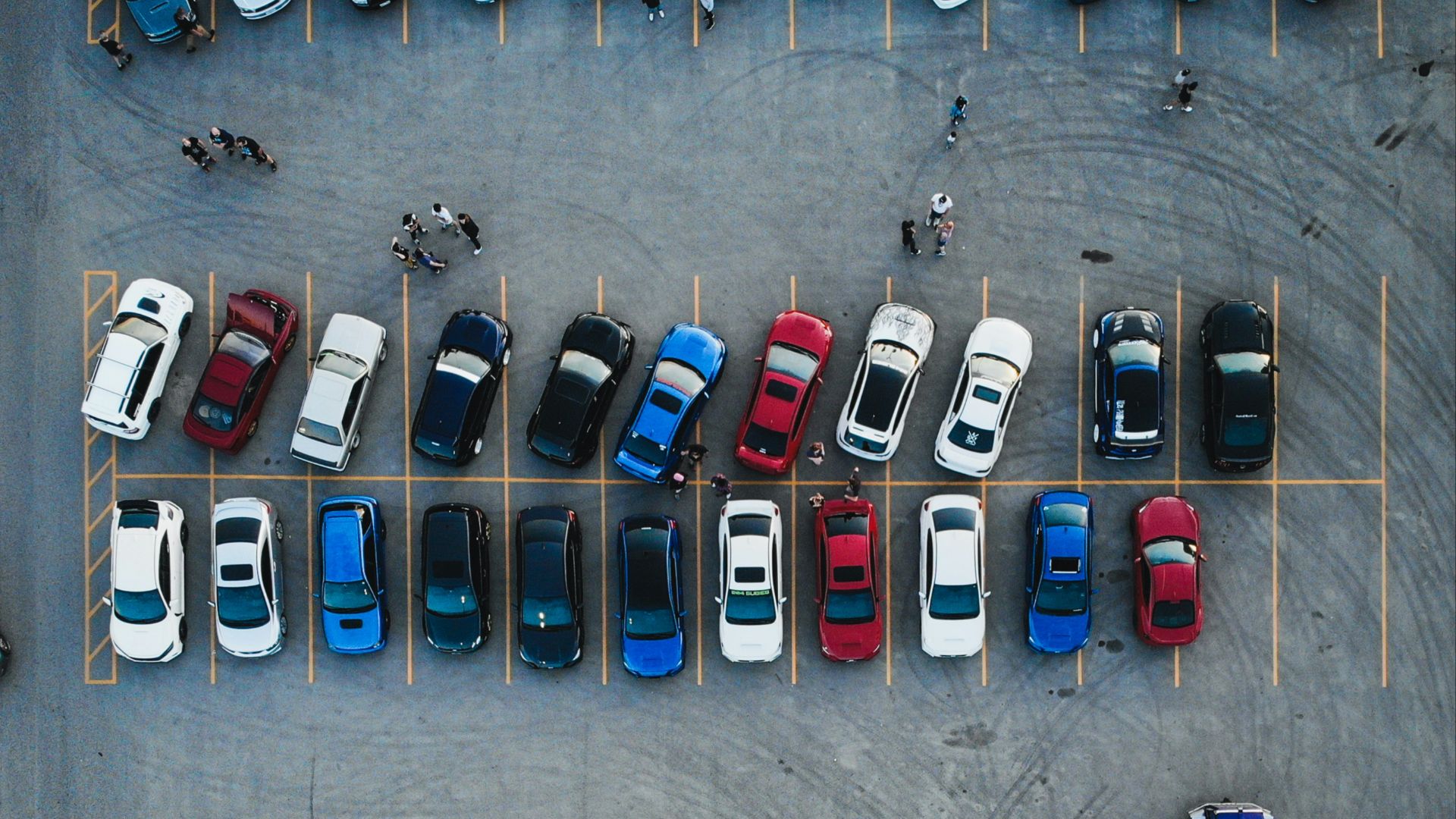 cars parked on parking lot during daytime