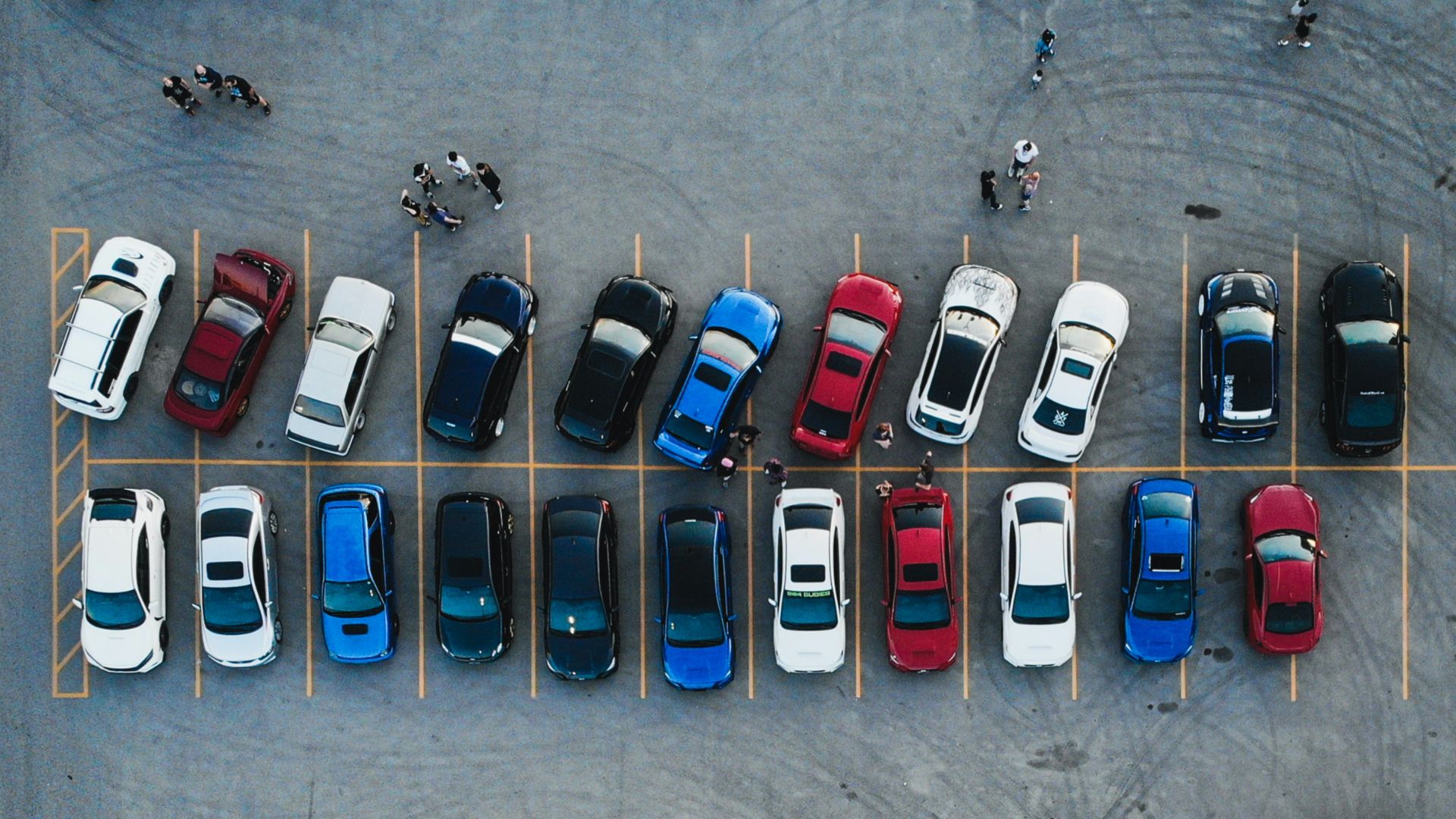 cars parked on parking lot during daytime