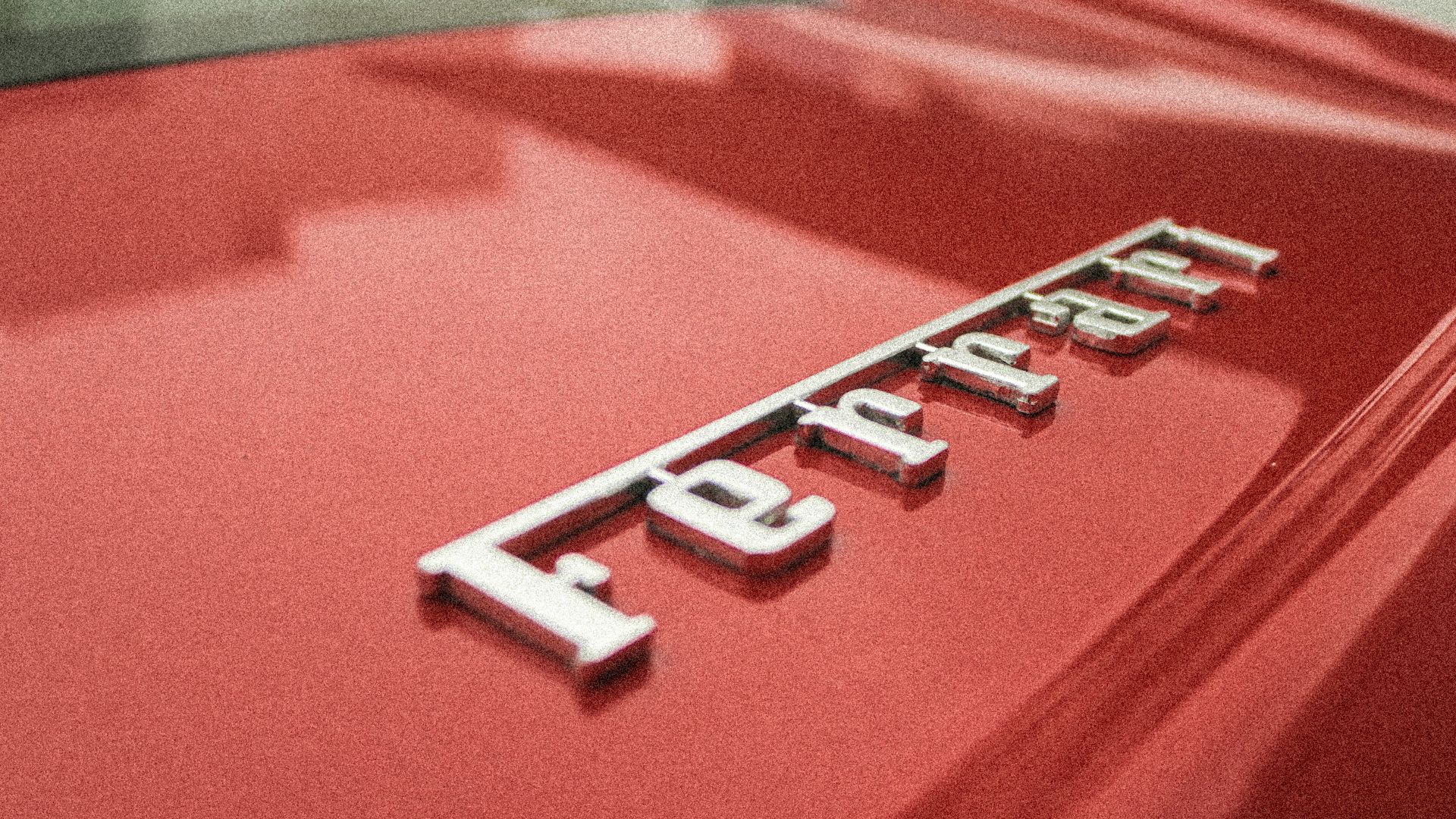 closeup photo of Ferrari emblem