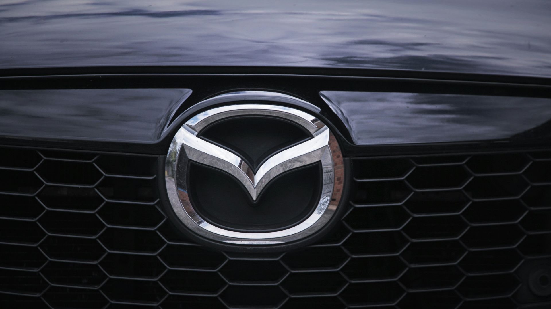 a close up of the front grill of a car