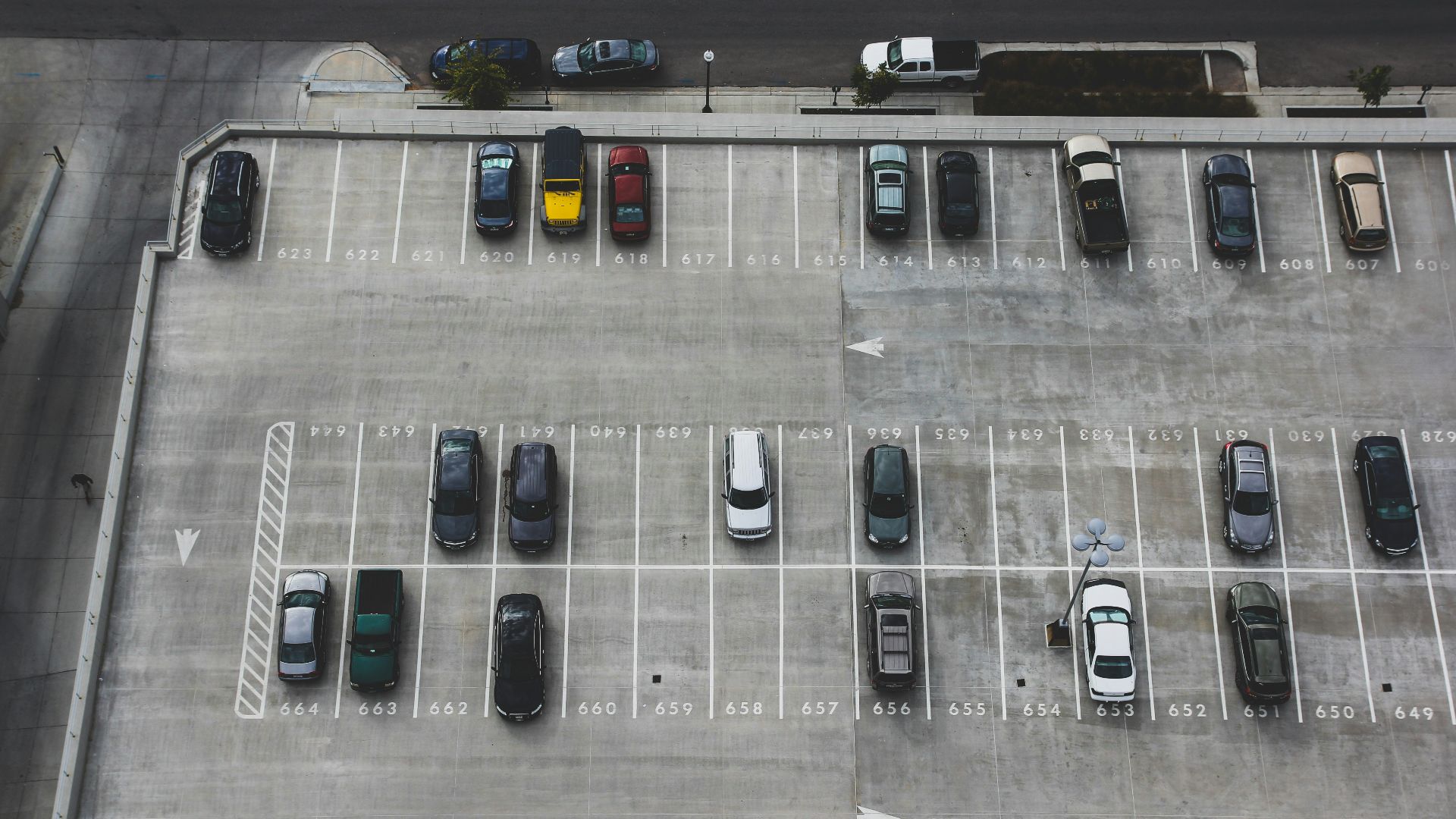 aerial view of cars parked on parking lot
