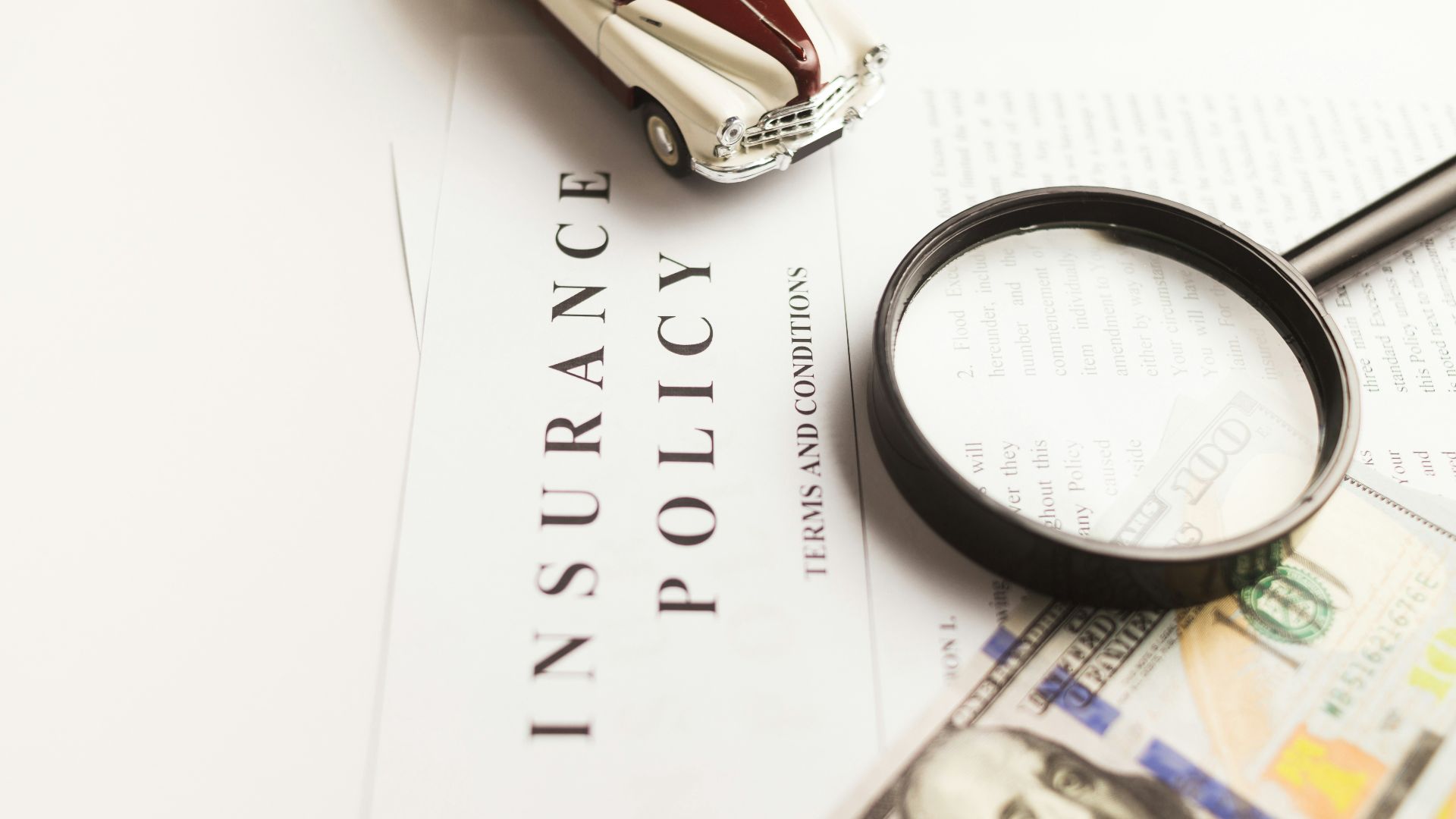 a magnifying glass sitting on top of a piece of paper