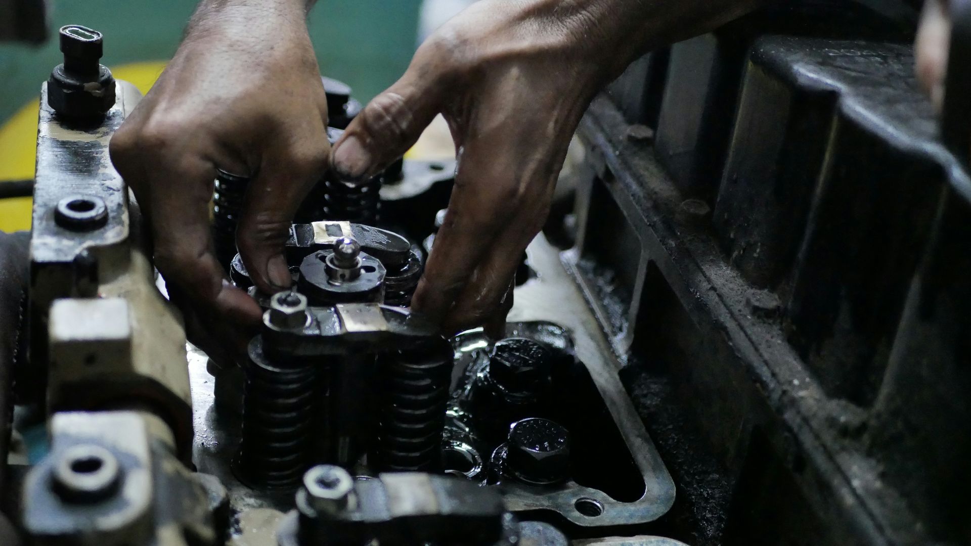person holding black metal tool