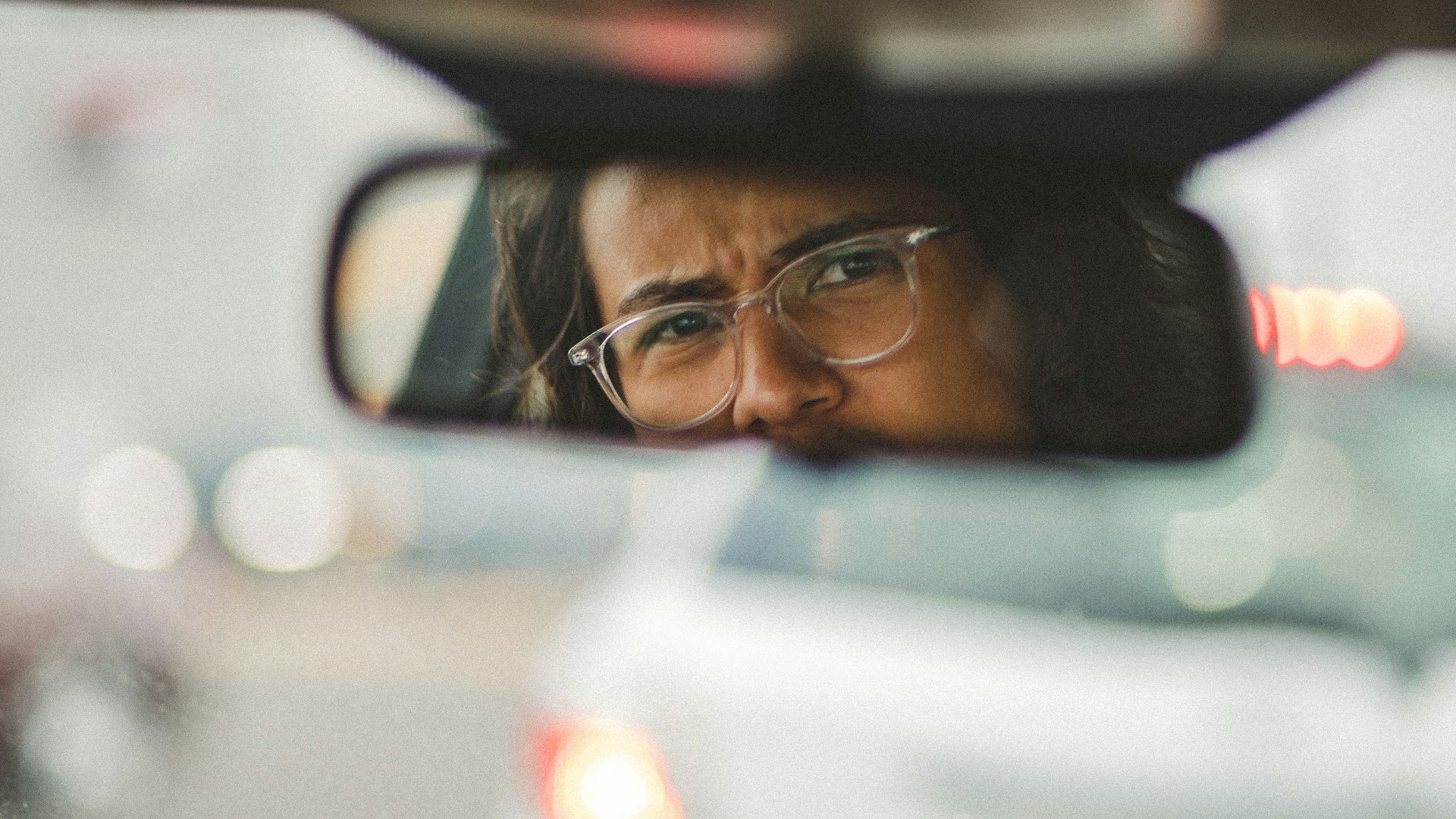man in black framed eyeglasses