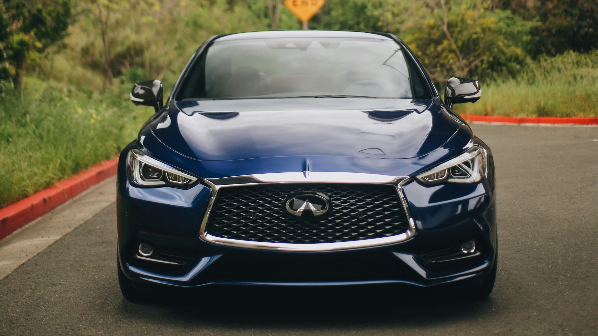 black bmw m 3 parked on gray asphalt road during daytime