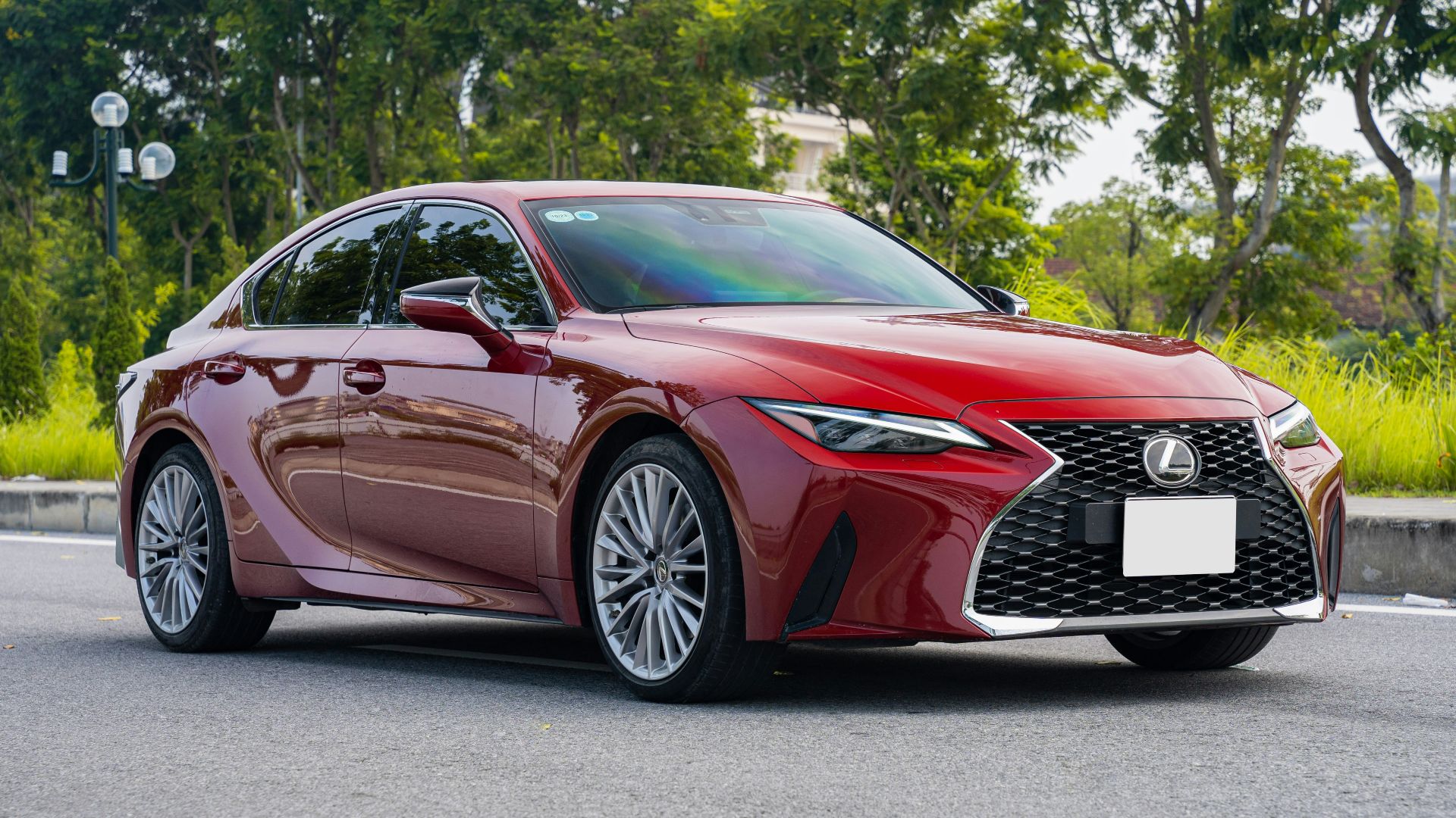 a red car parked on the side of a road