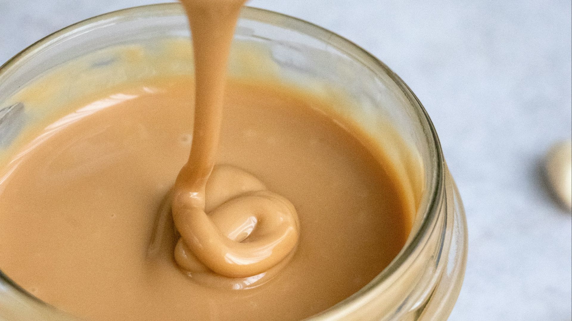 clear glass jar with brown liquid