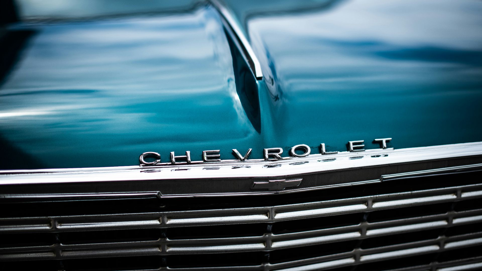 blue and silver mercedes benz car