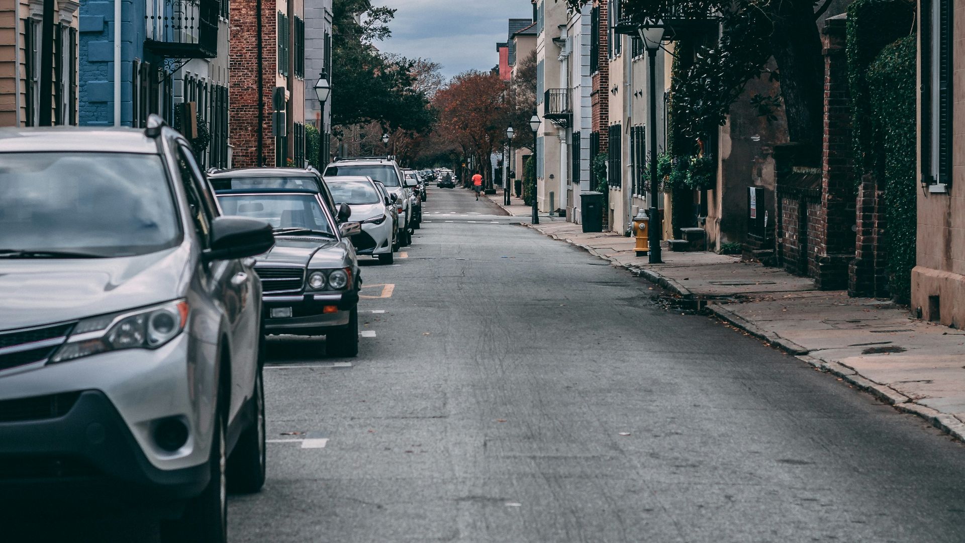 cars parked on side of the road during daytime