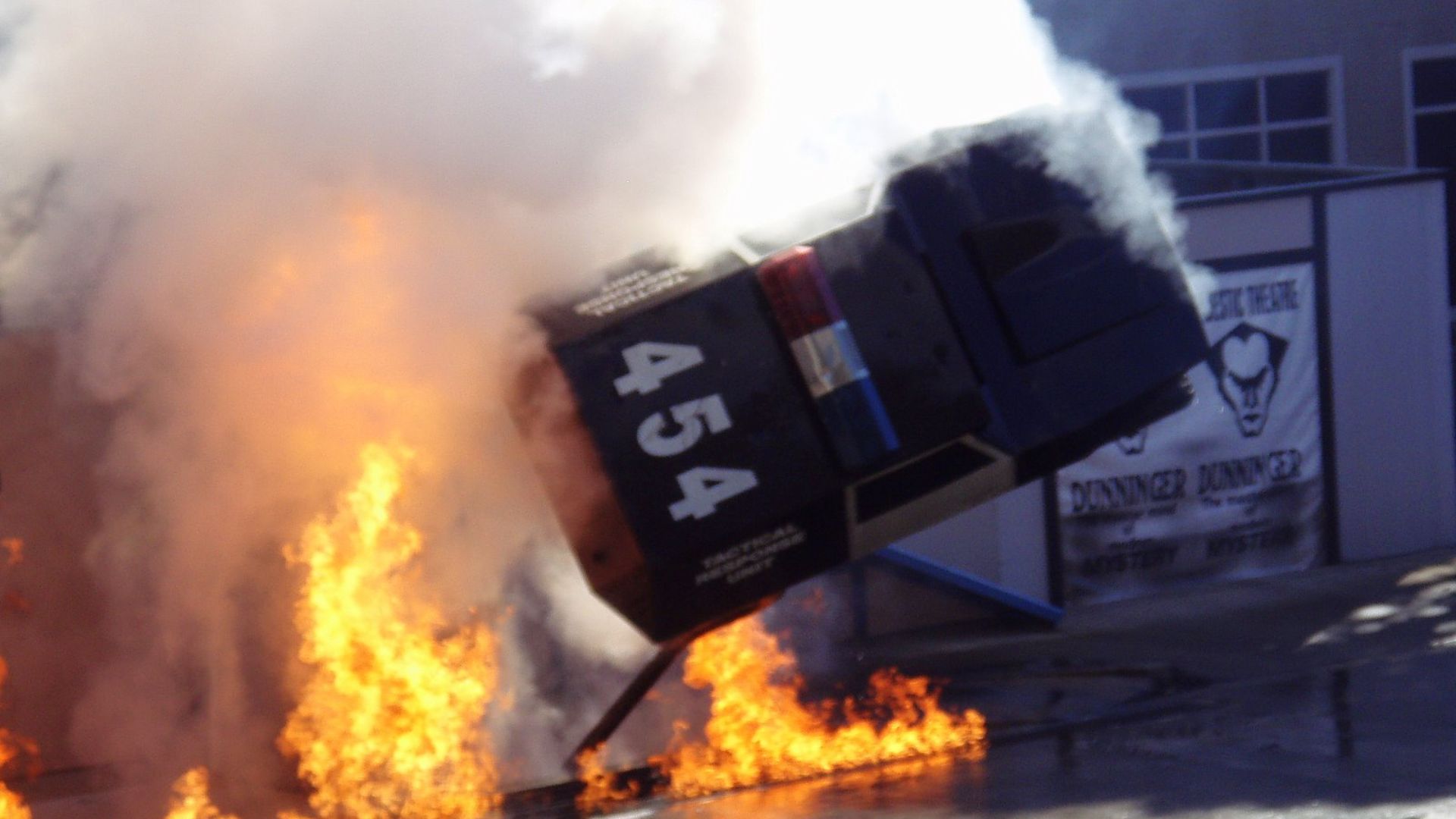 File:Police Academy Stunt Show - explosion and car flip.jpg