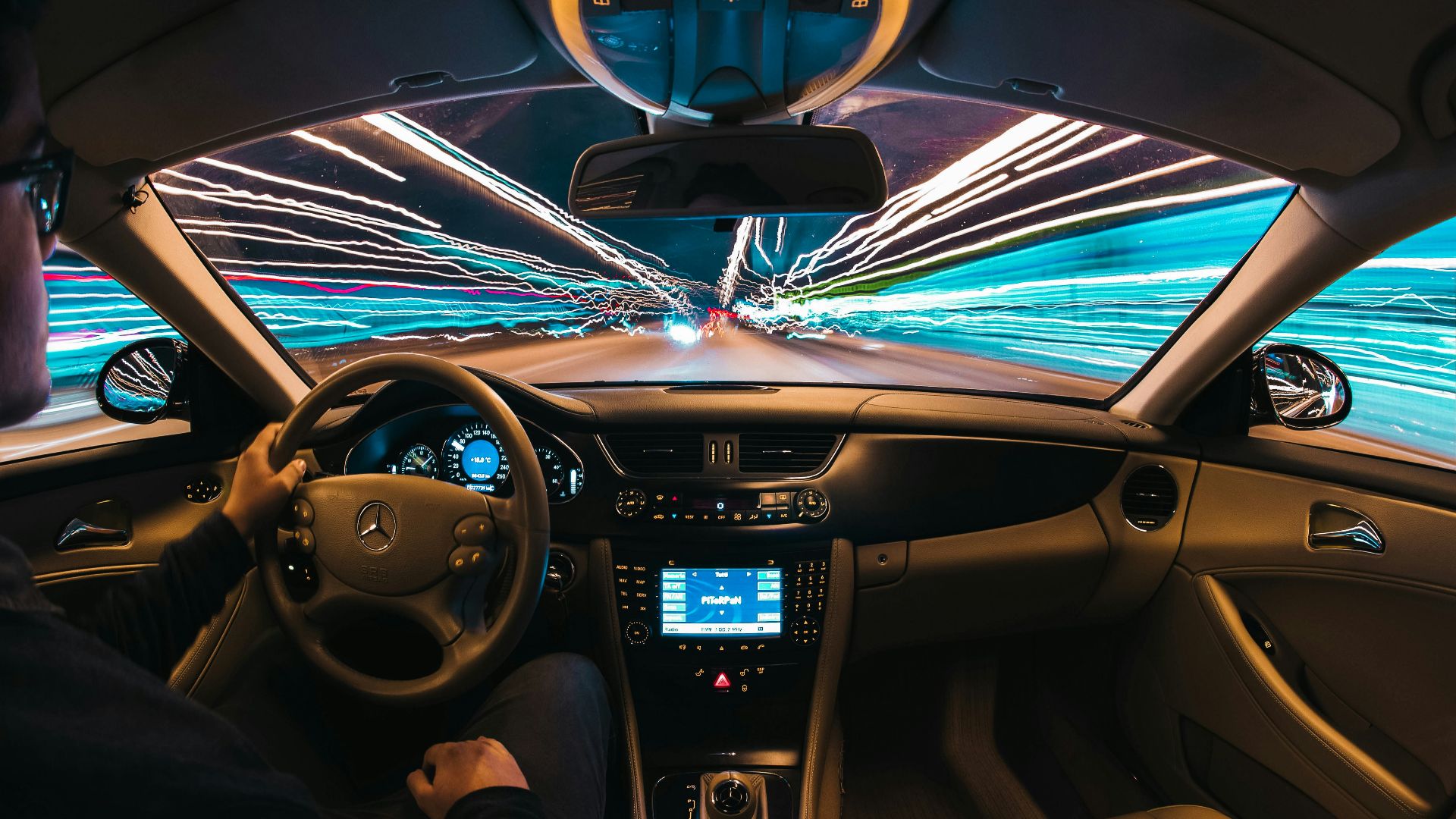 time lapse photography of man riding car