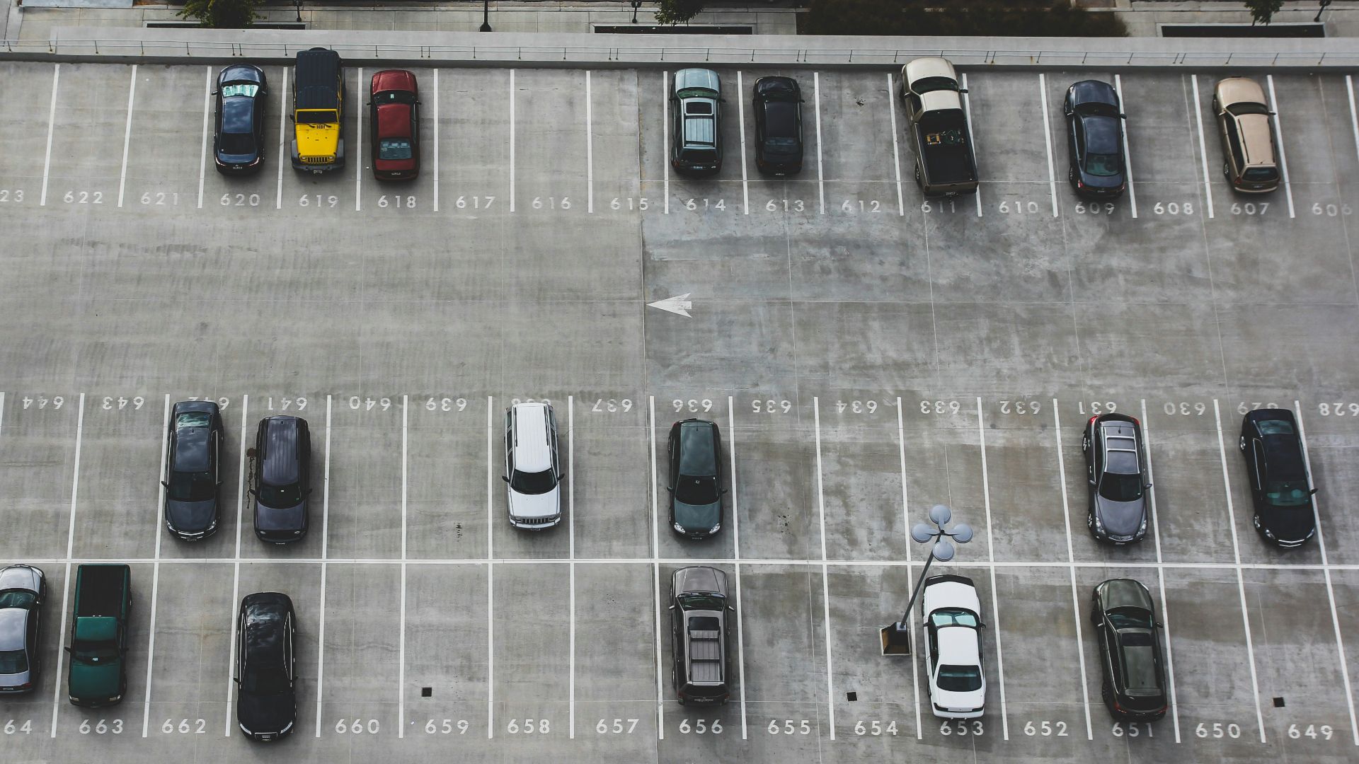 aerial view of cars parked on parking lot