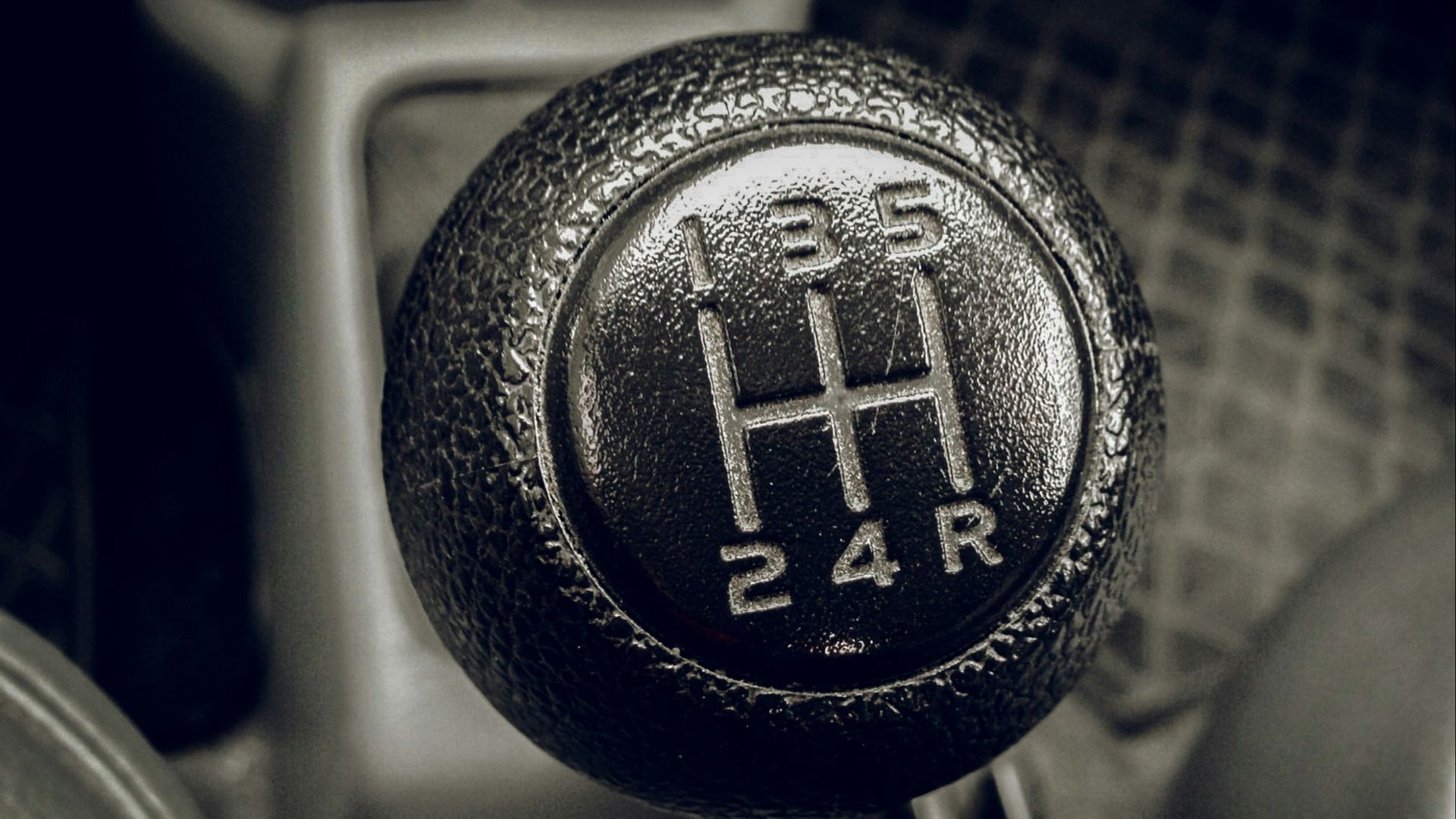 a close up of a car's gear stick