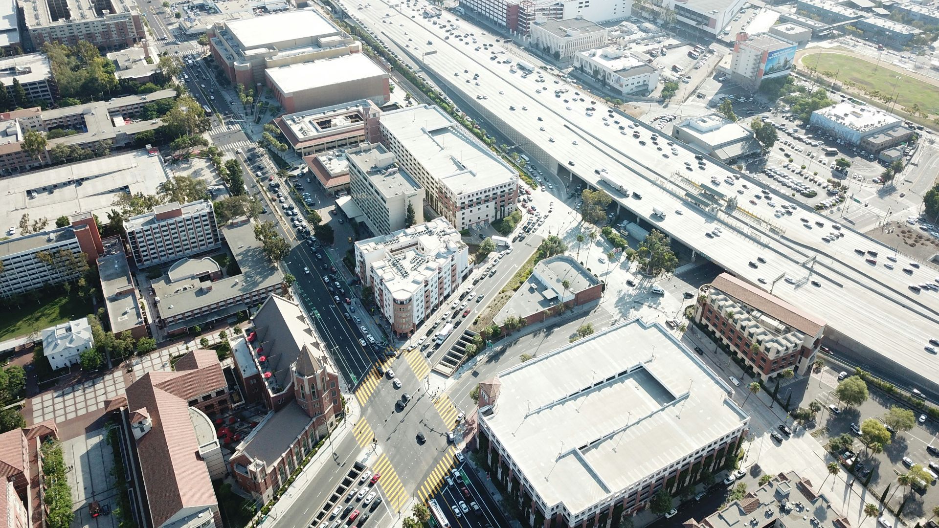 aerial photo of city buildings and roads during daytime