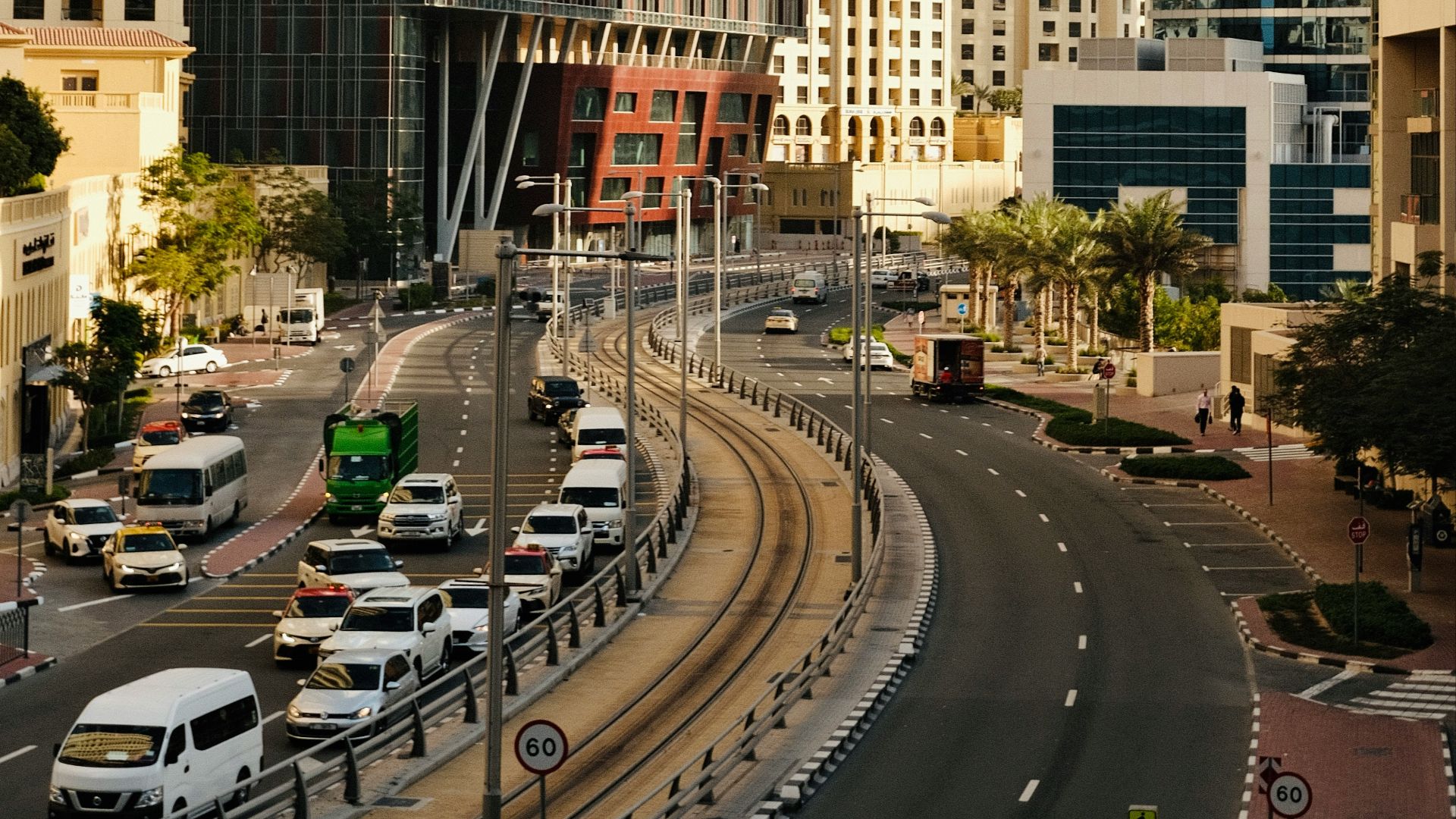 a city street filled with lots of tall buildings