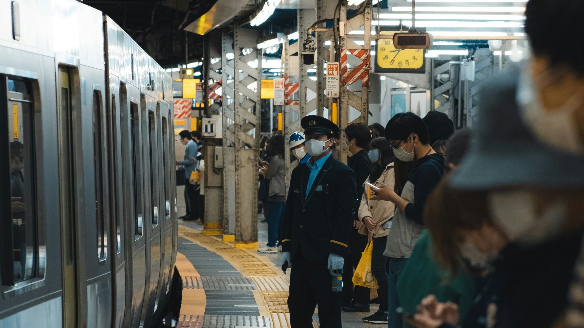 people walking on sidewalk during daytime