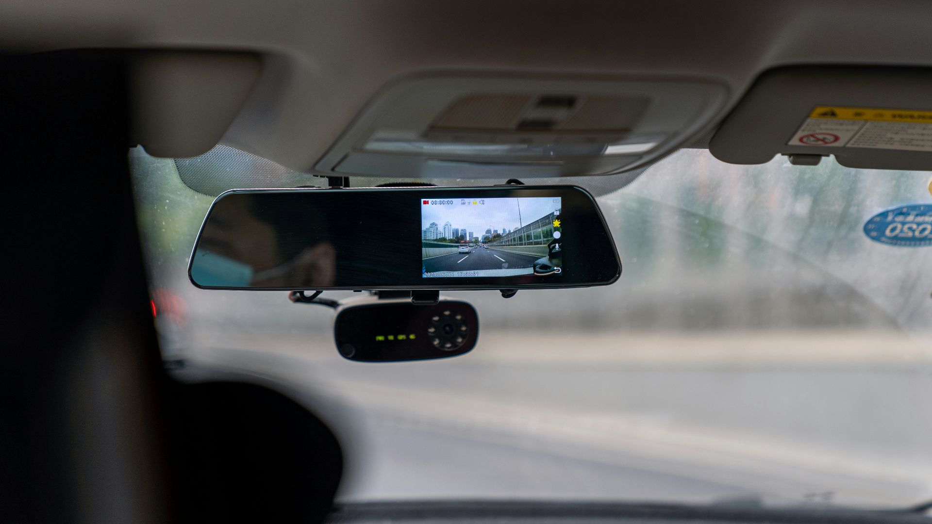 car side mirror with water droplets