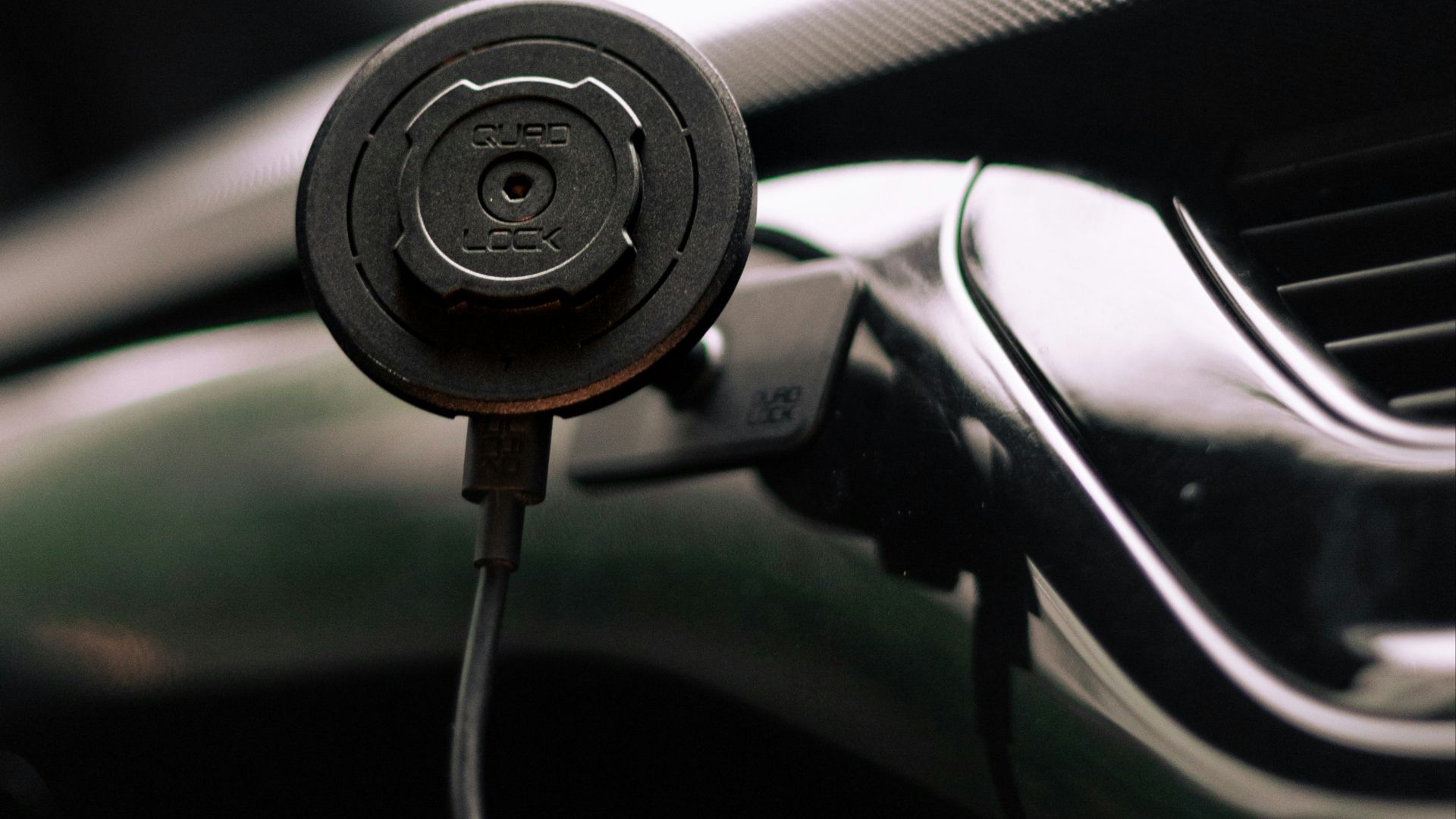 a close up of a steering wheel of a car