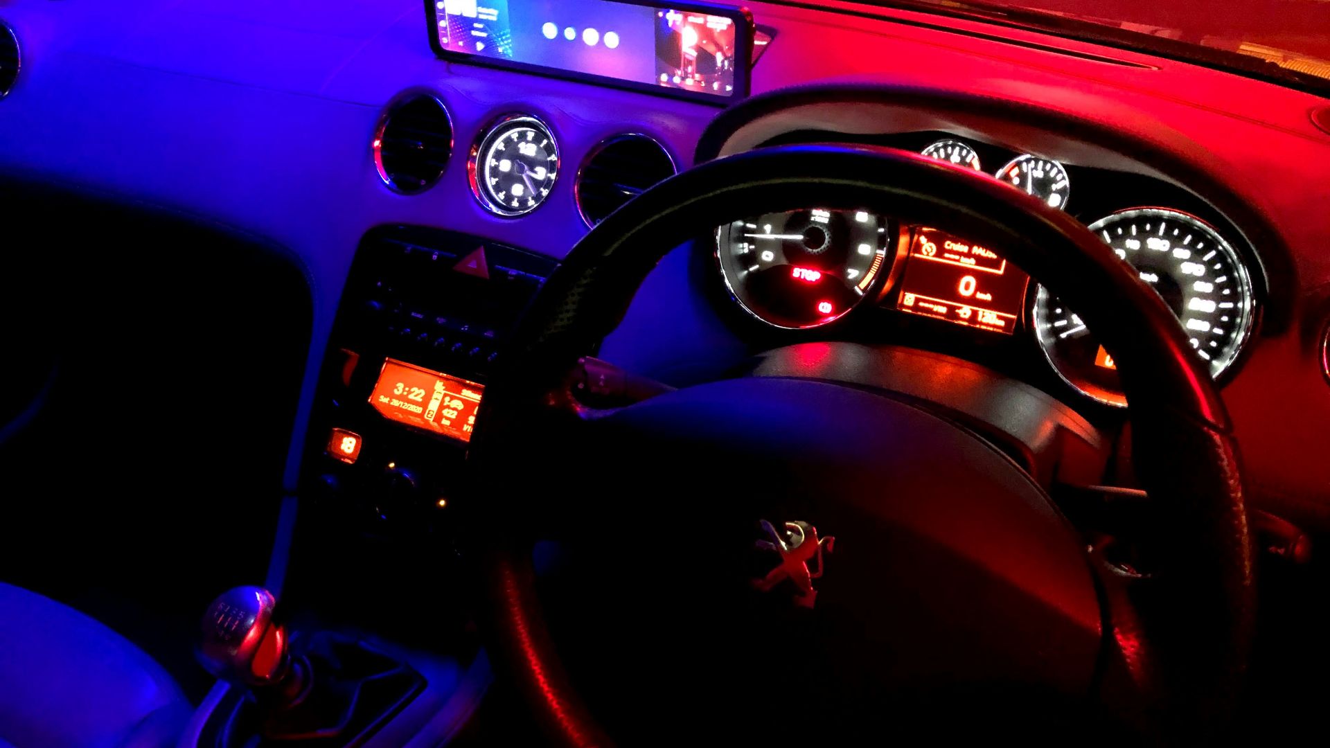 black and red car steering wheel