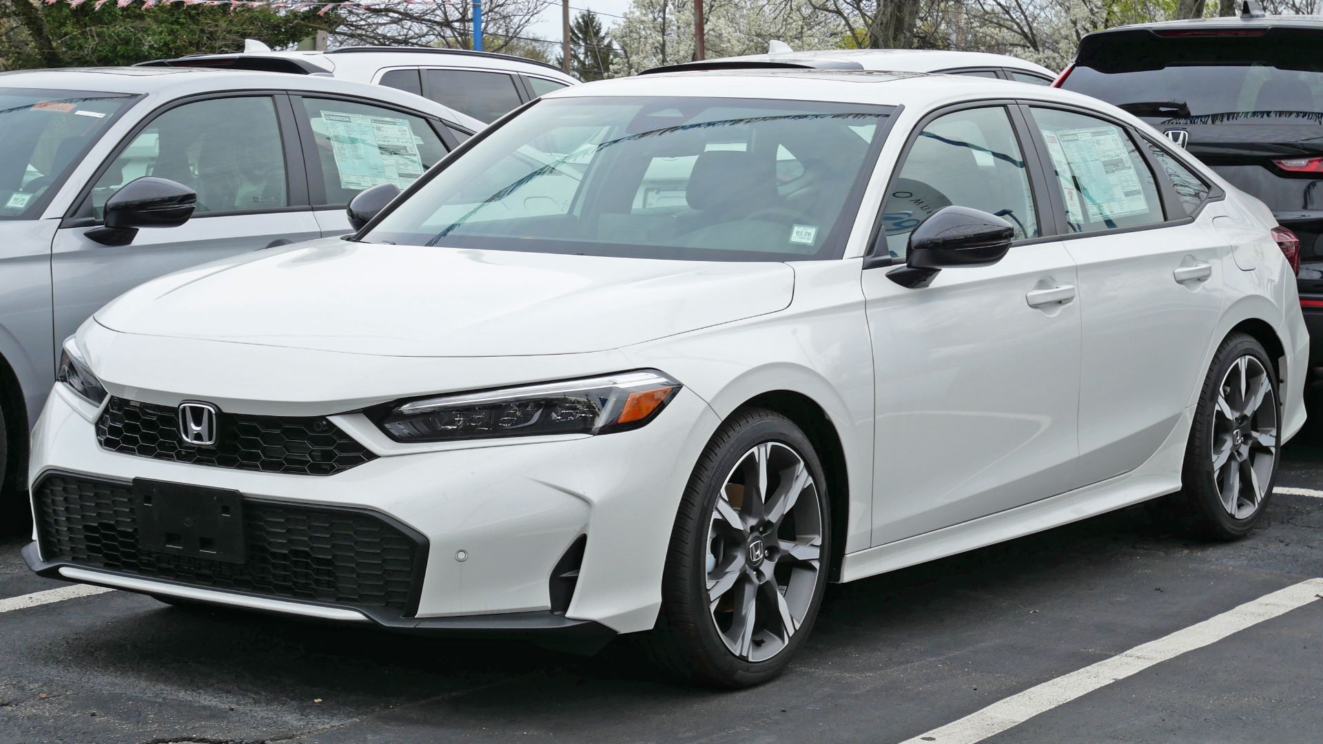 File:2025 Honda Civic Hybrid Sport Touring (facelift), front 4.18.25.jpg