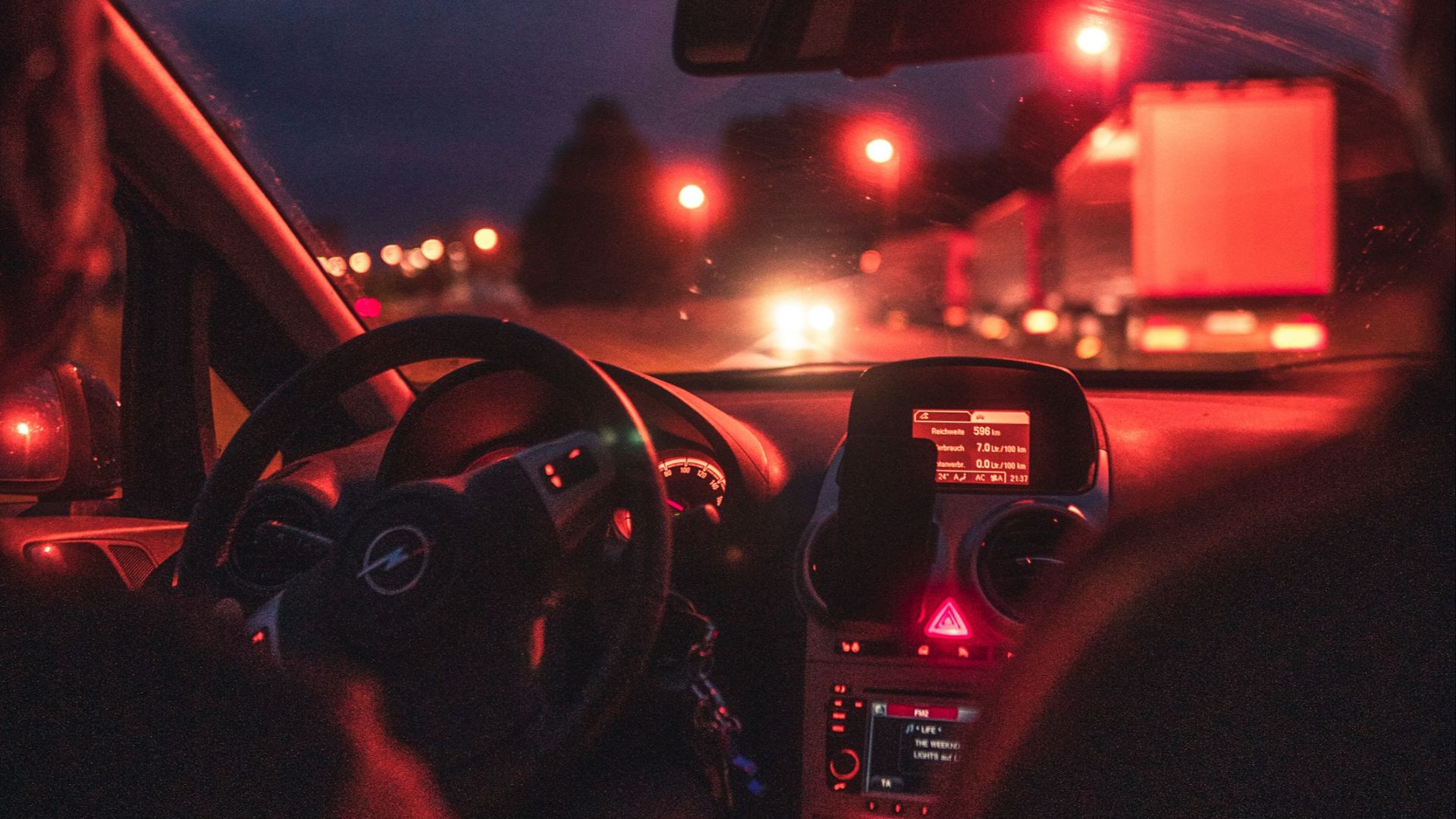 man driving car during night time