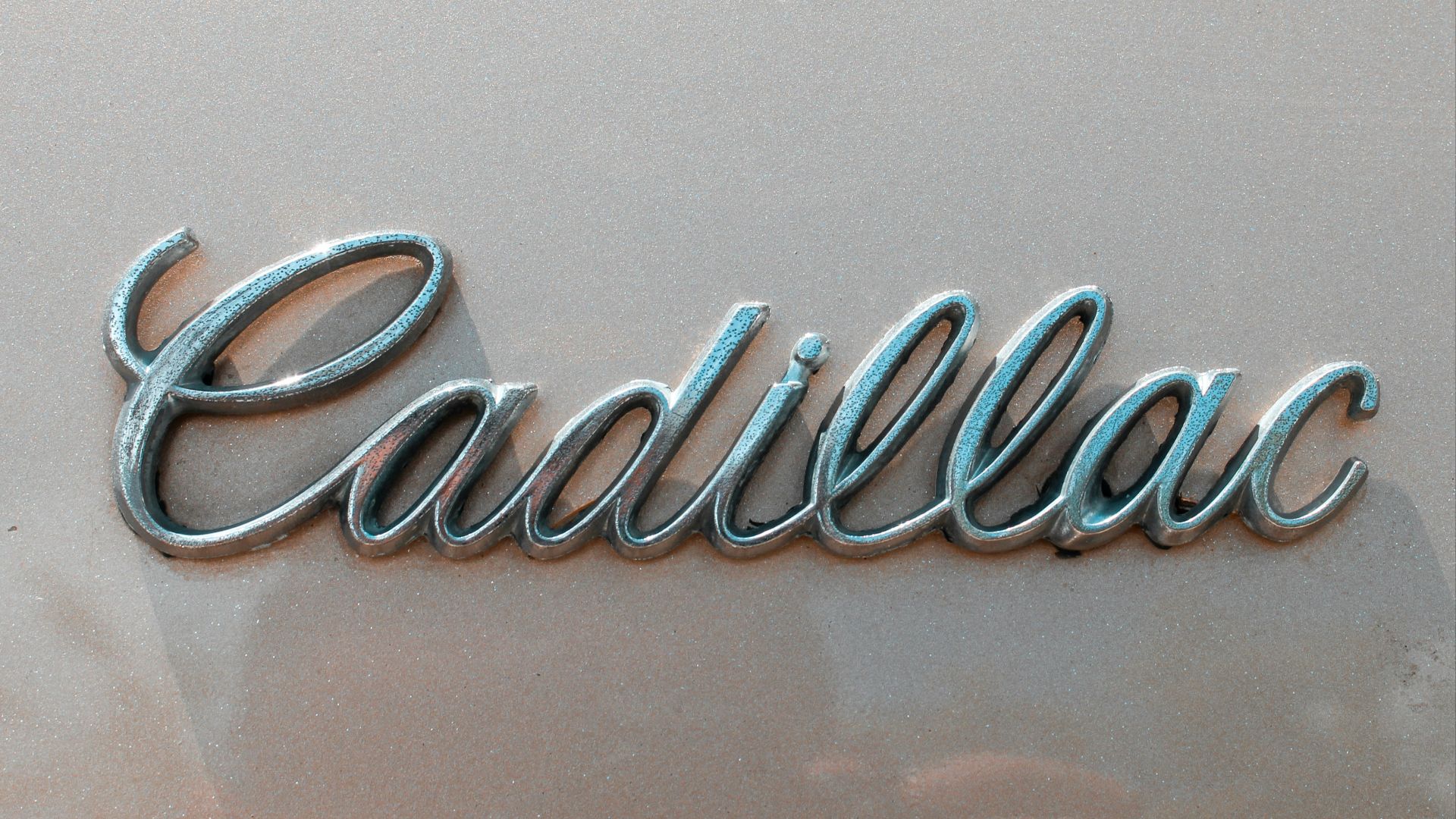 silver and diamond ring on white table