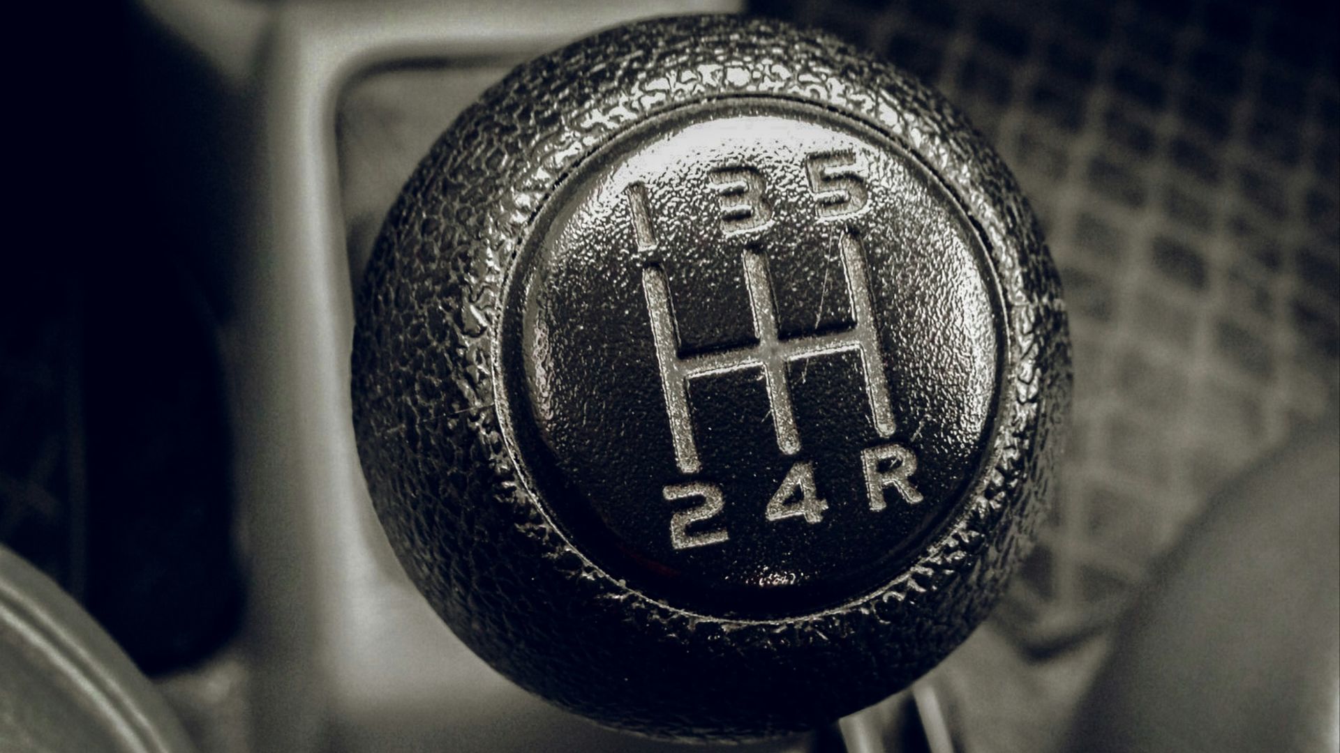 a close up of a car's gear stick