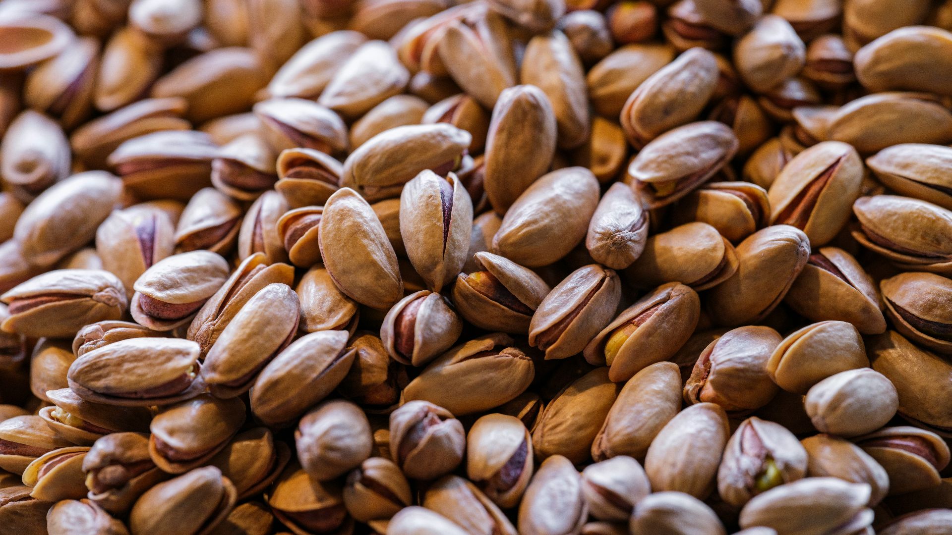 A close up of a pile of nuts
