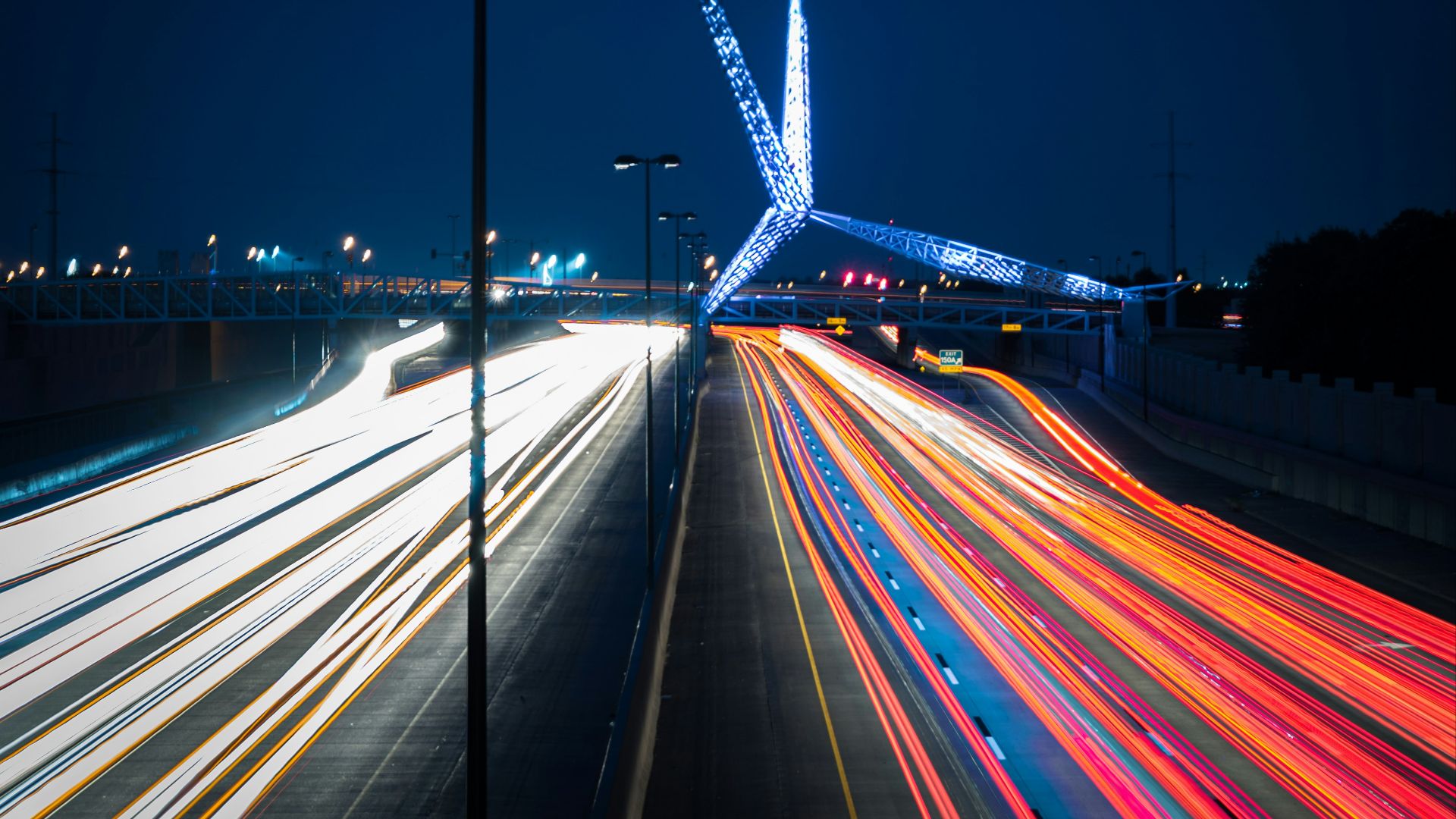 time lapse photography of cars on road during night time