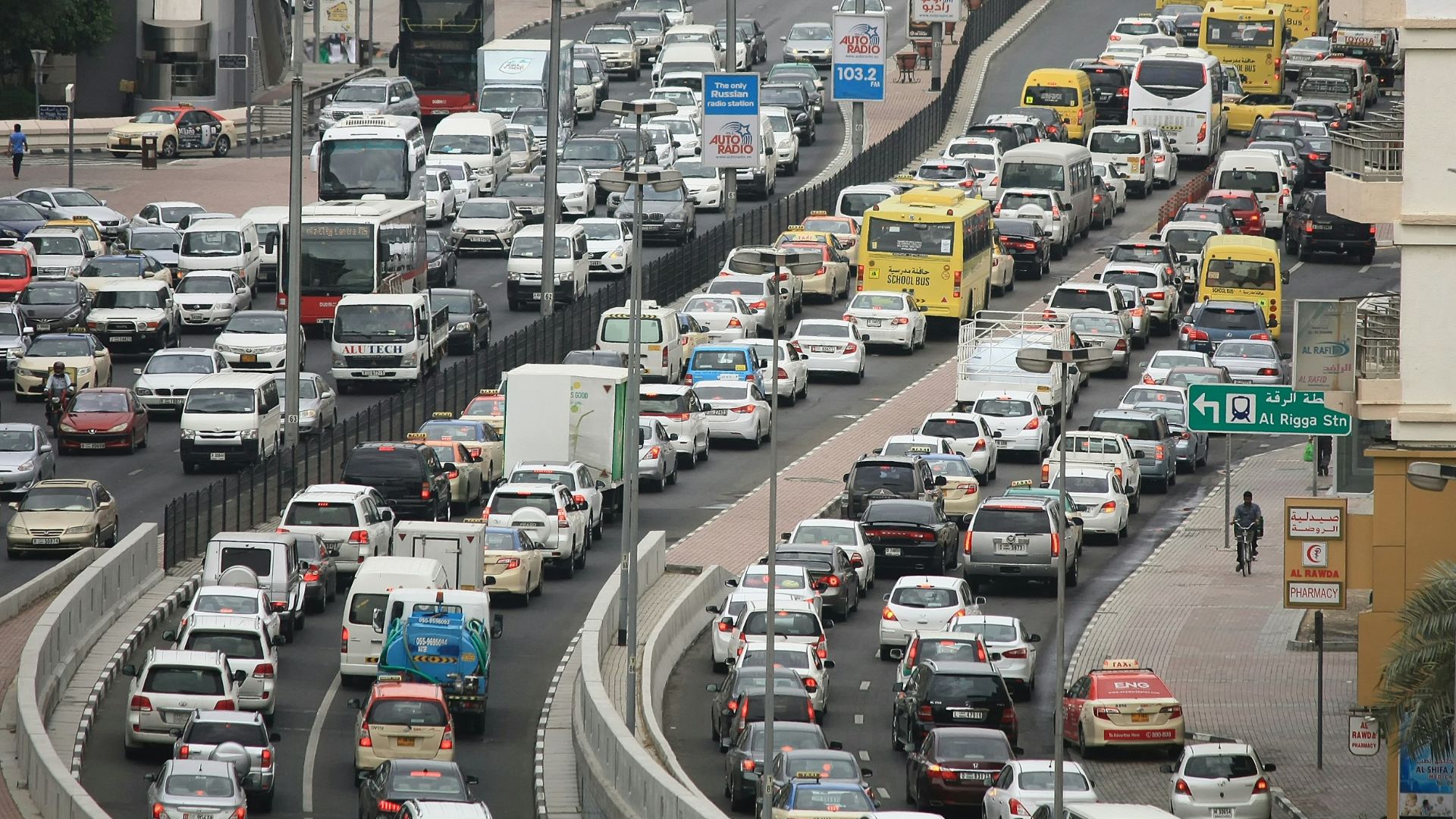 vehicles on road at daytime selective photography