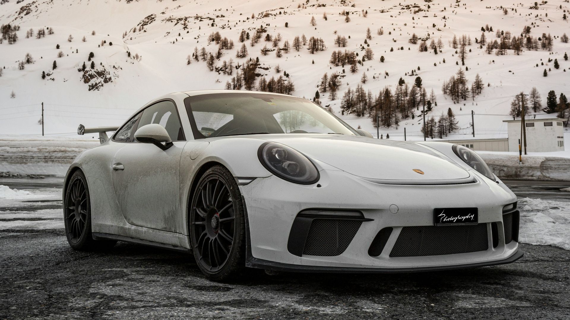 silver porsche 911 on road during daytime