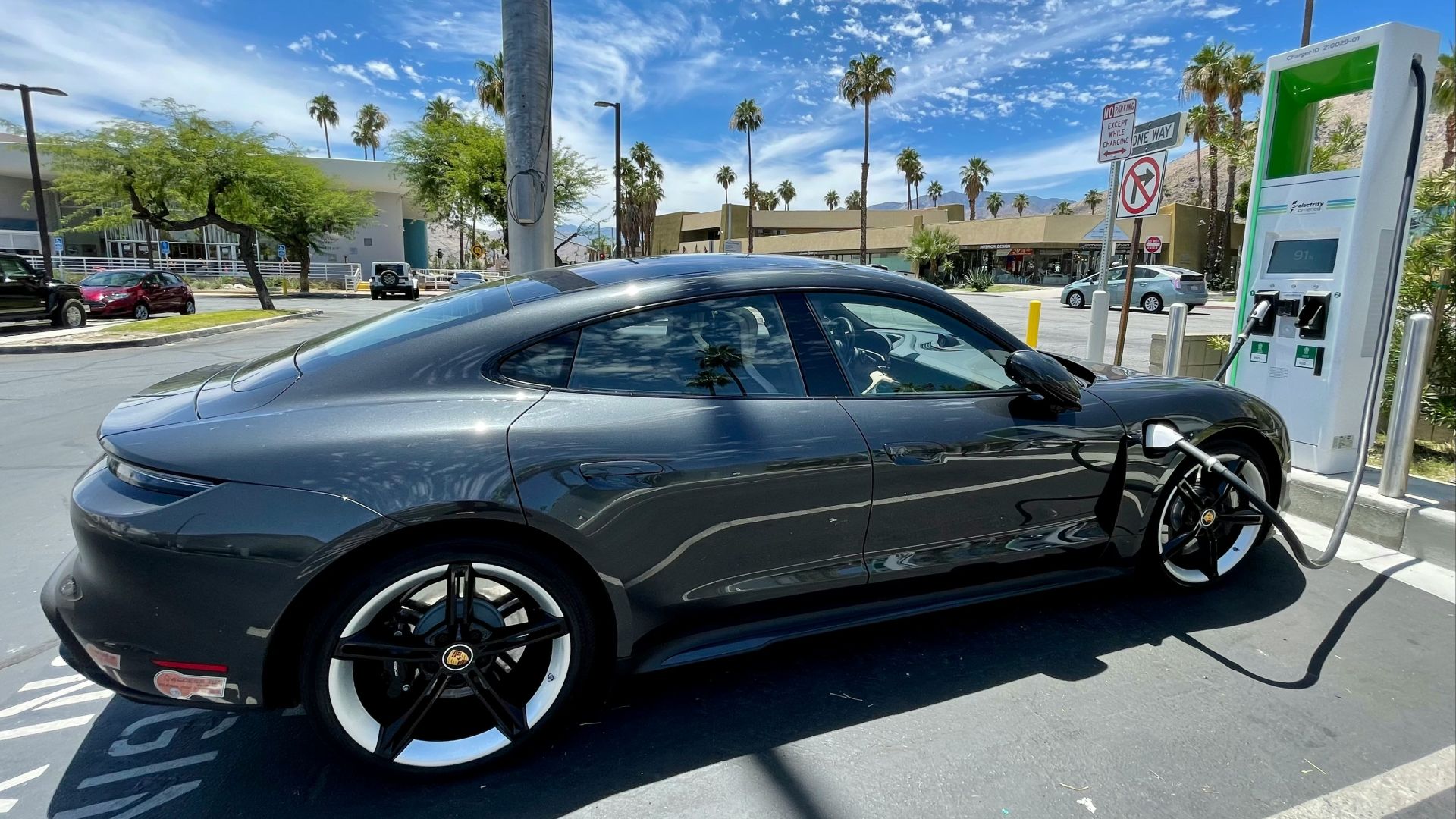 black sedan on road during daytime