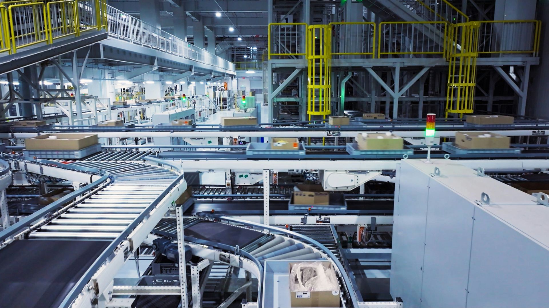 a factory filled with lots of machines and boxes