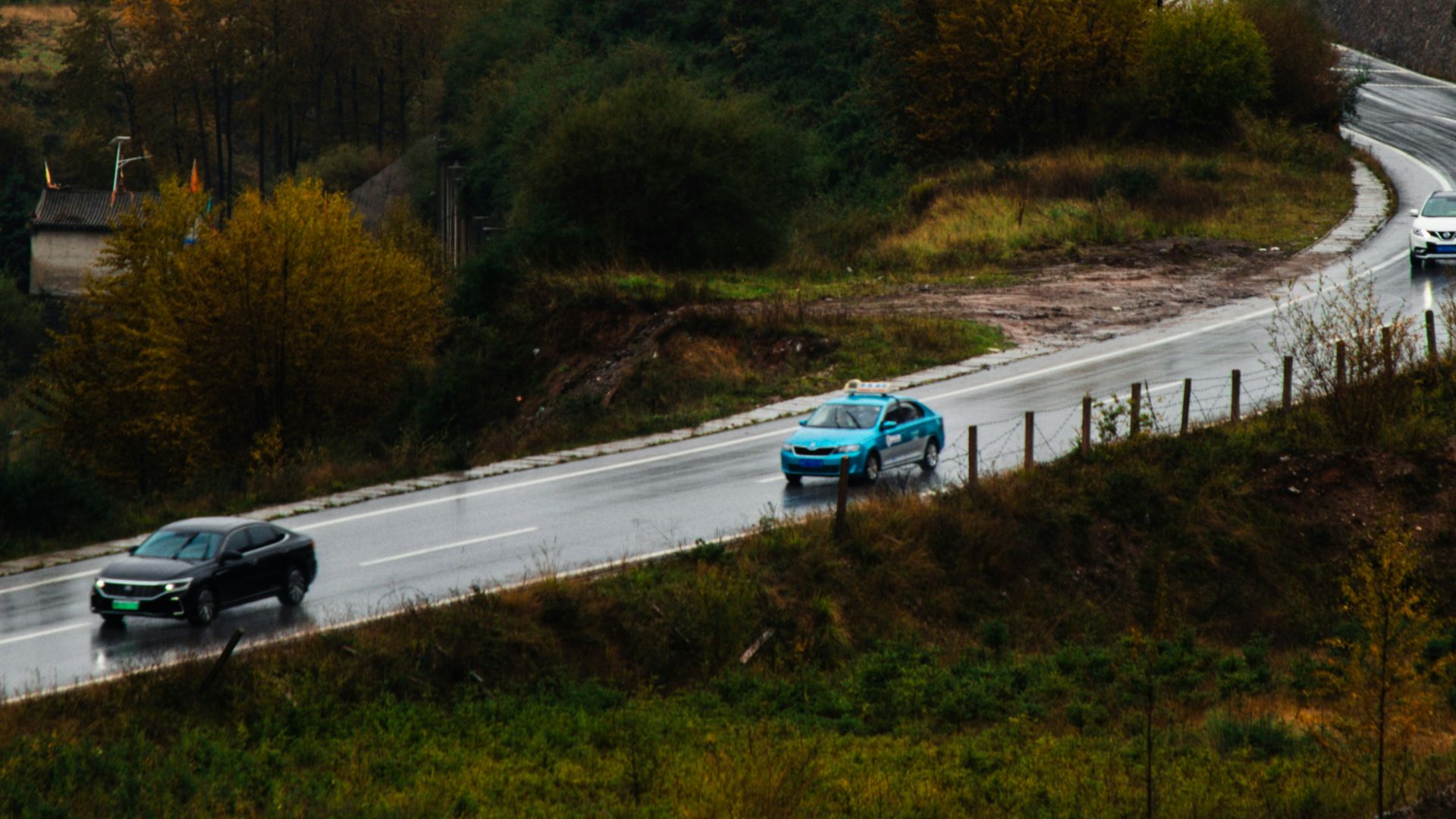 Cars driving on a road in the mountains