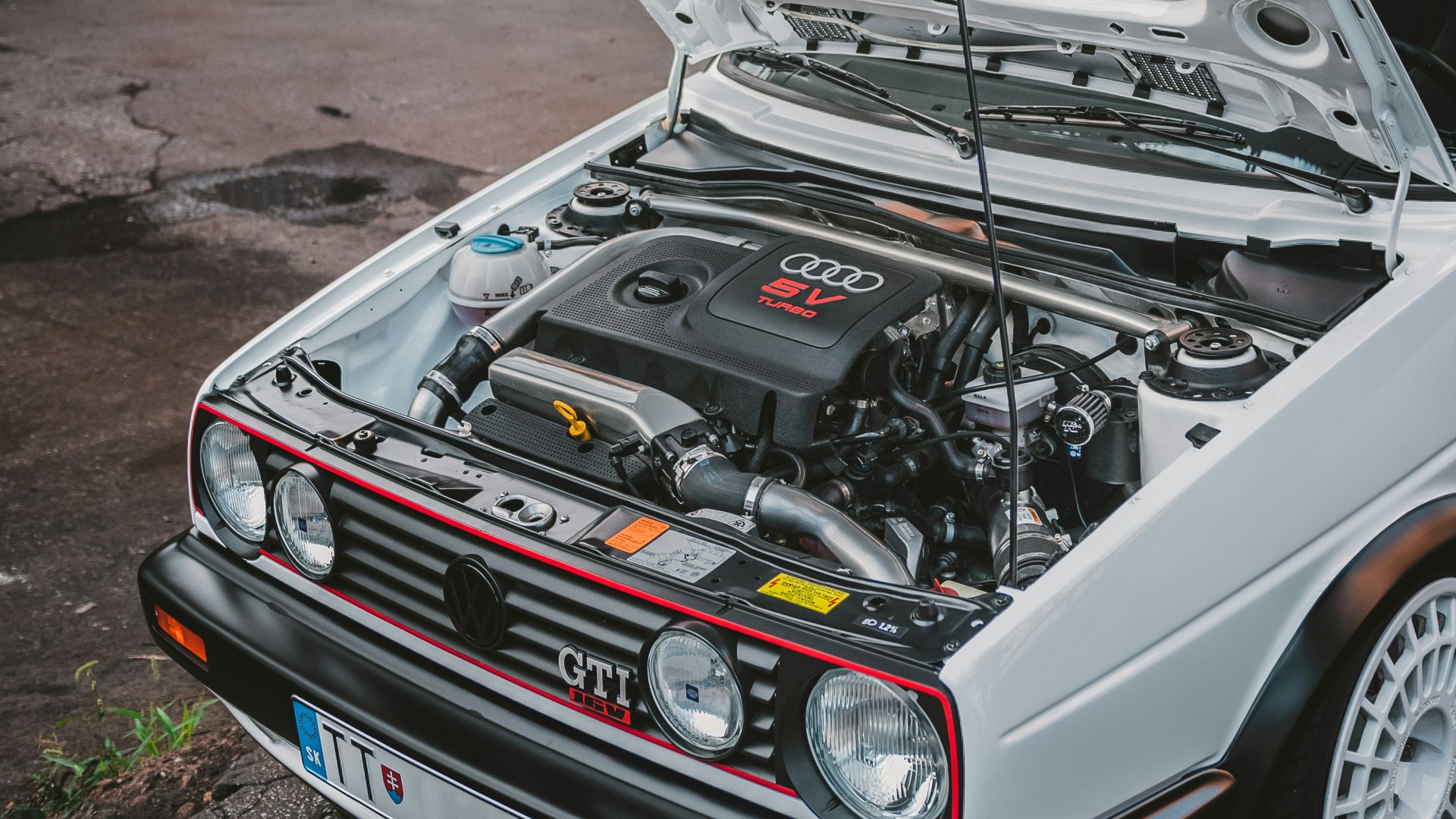 white vehicle engine bay