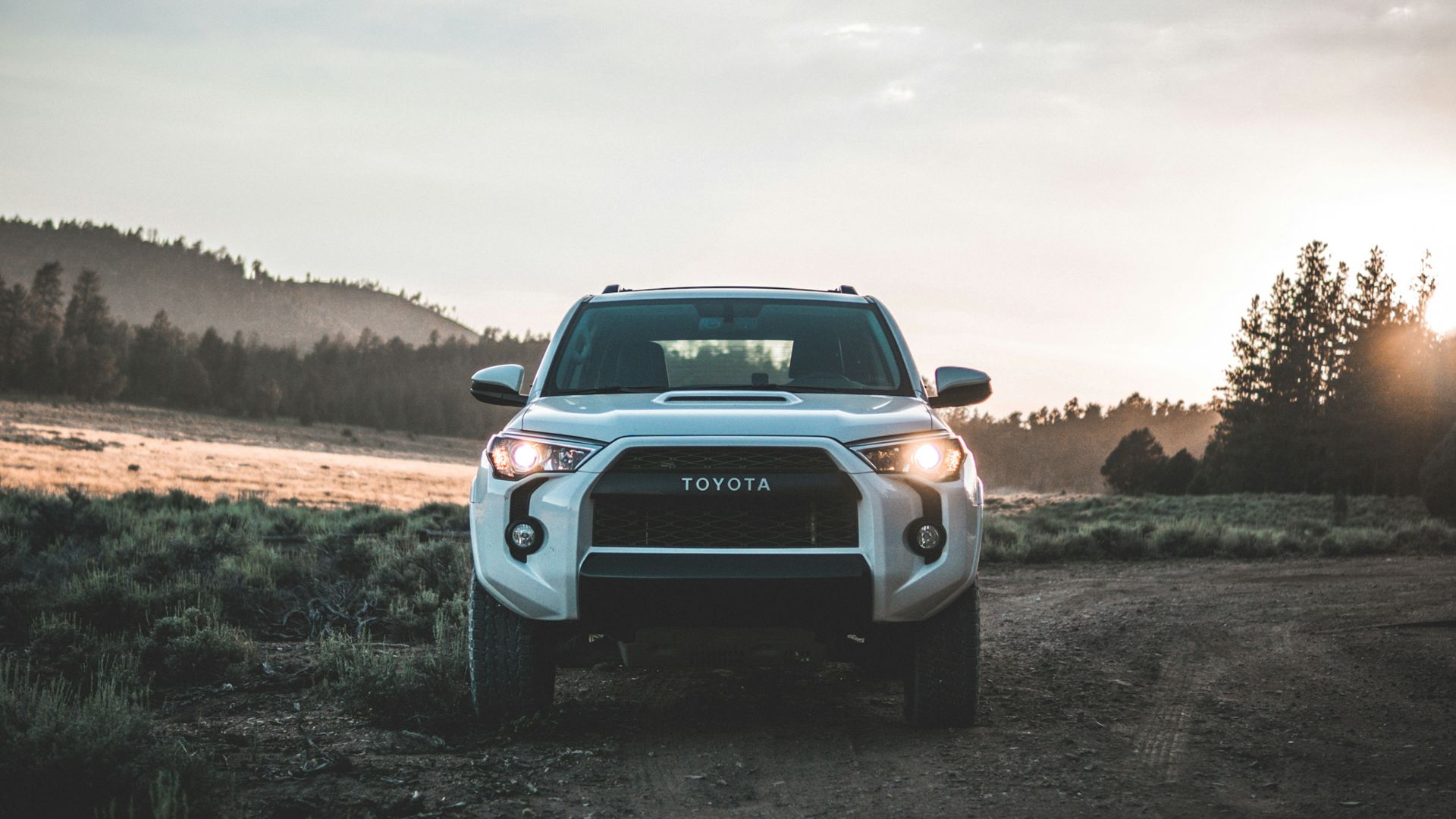 parked white Toyota vehicle