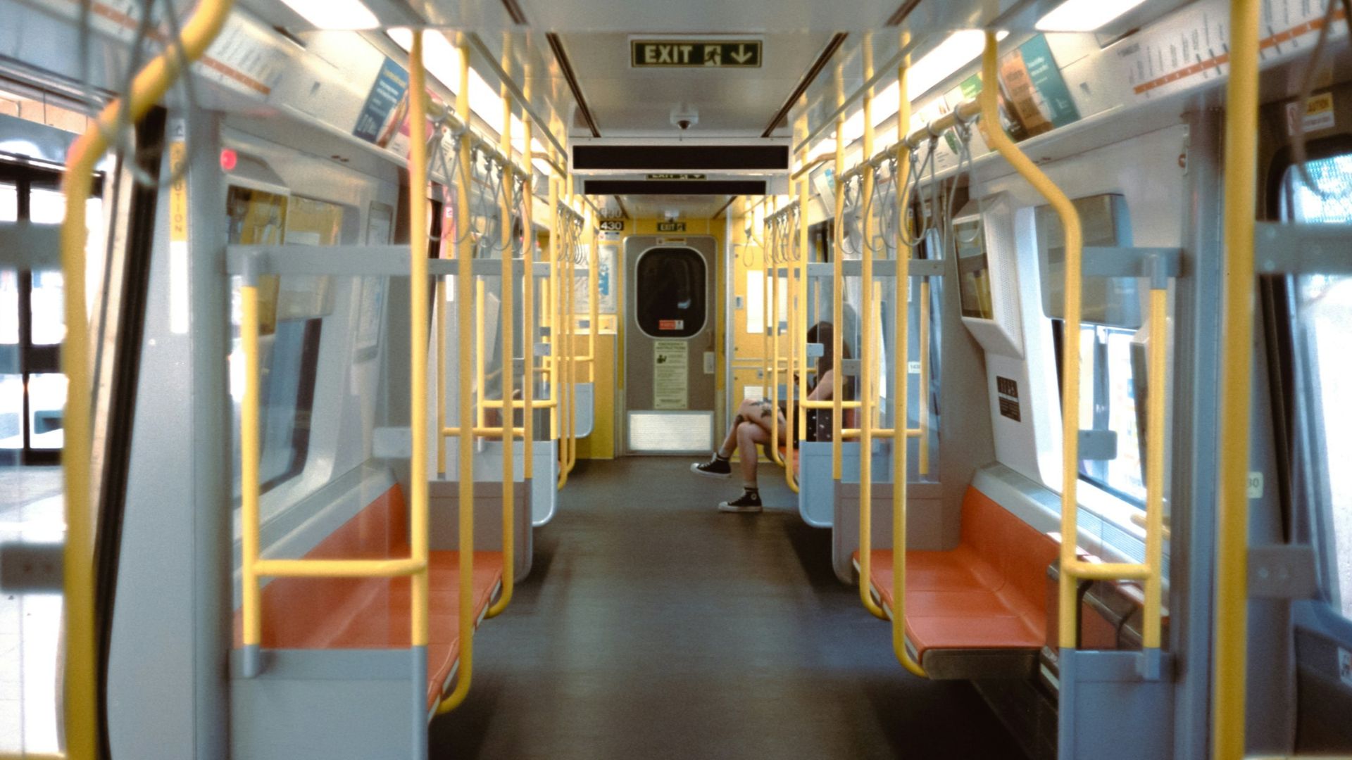 a view of the inside of a subway car