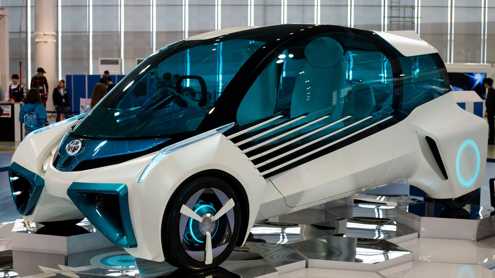 white and blue vehicle inside the building