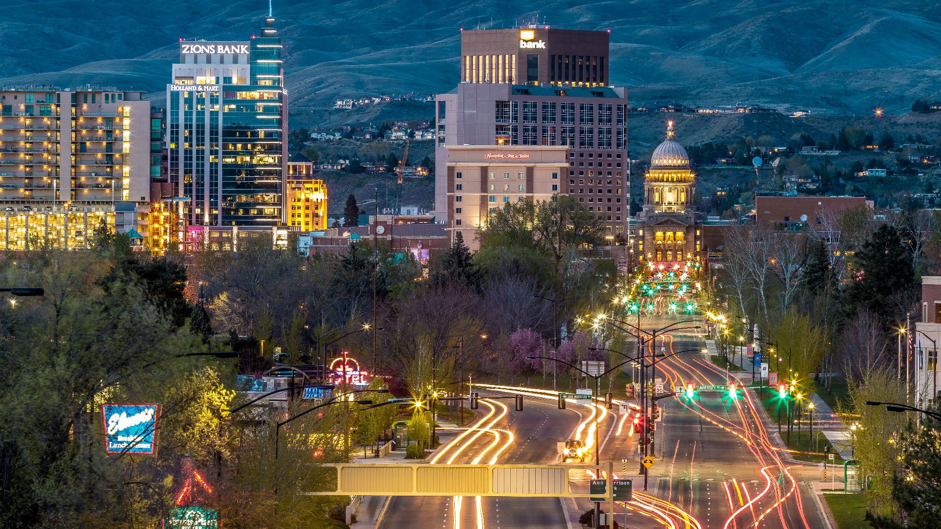 gray, blue, and black concrete city buildings