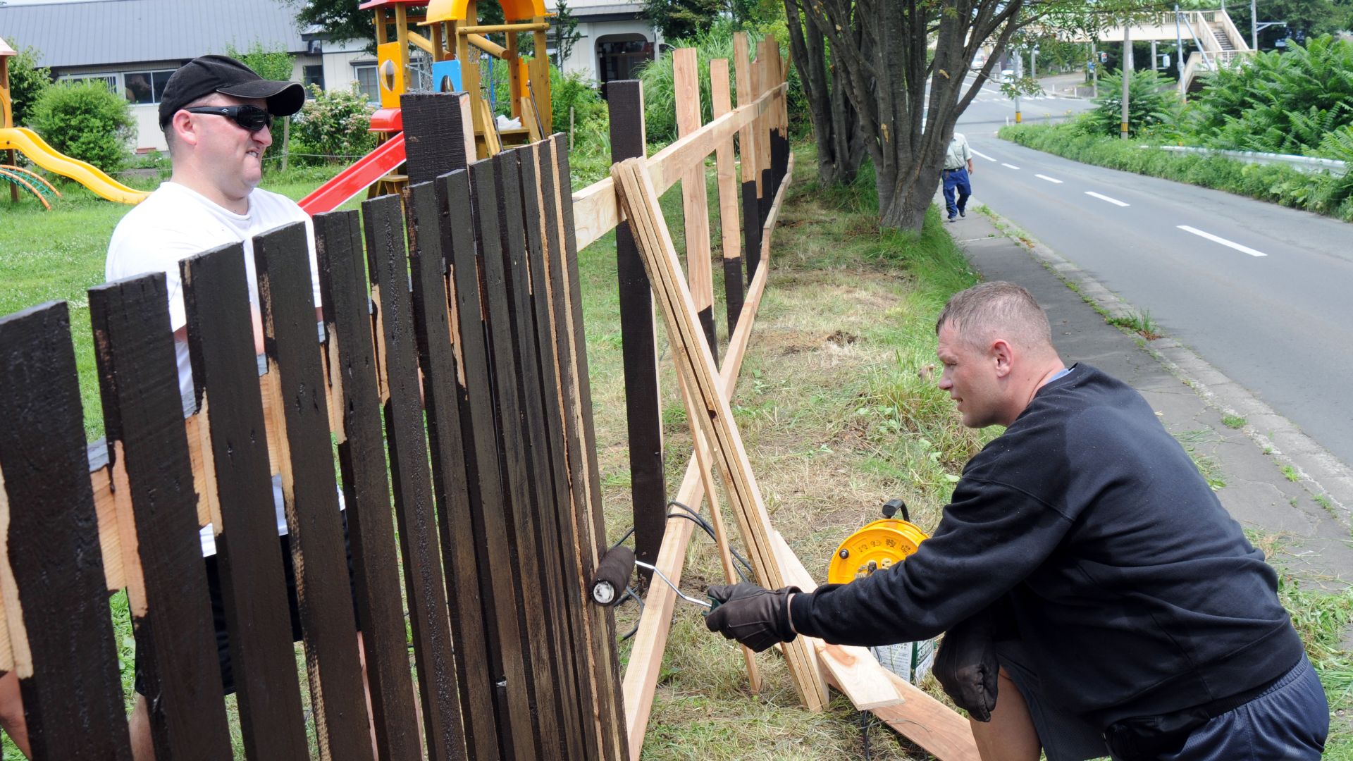 File:US Navy 100726-N-2653B-075 Volunteers from the Naval Air Facility Misawa First Class Petty Officer Association paint a fence of the Bikou-en Childrens Home to help improve safety.jpg