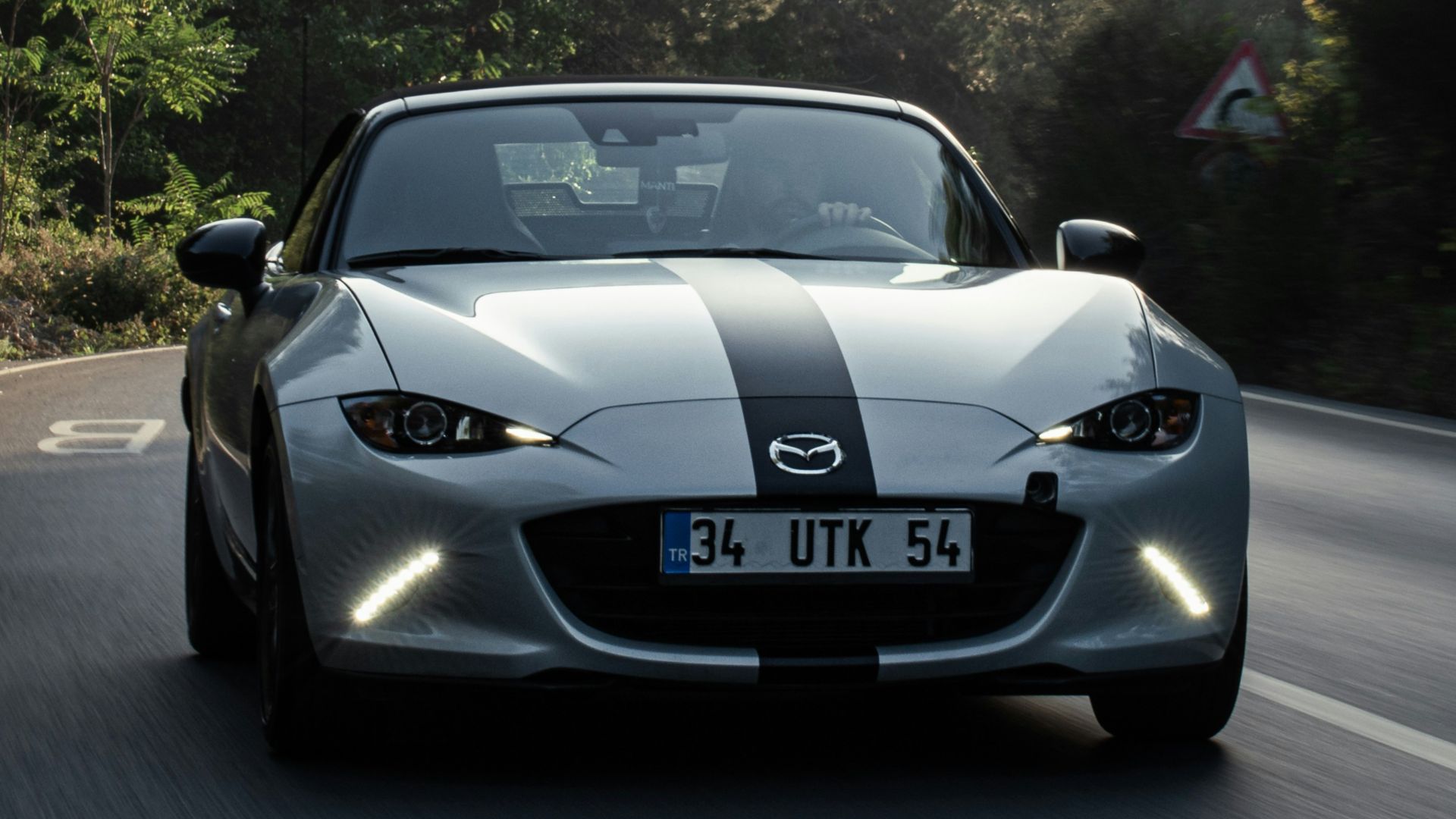 black porsche 911 on road during daytime