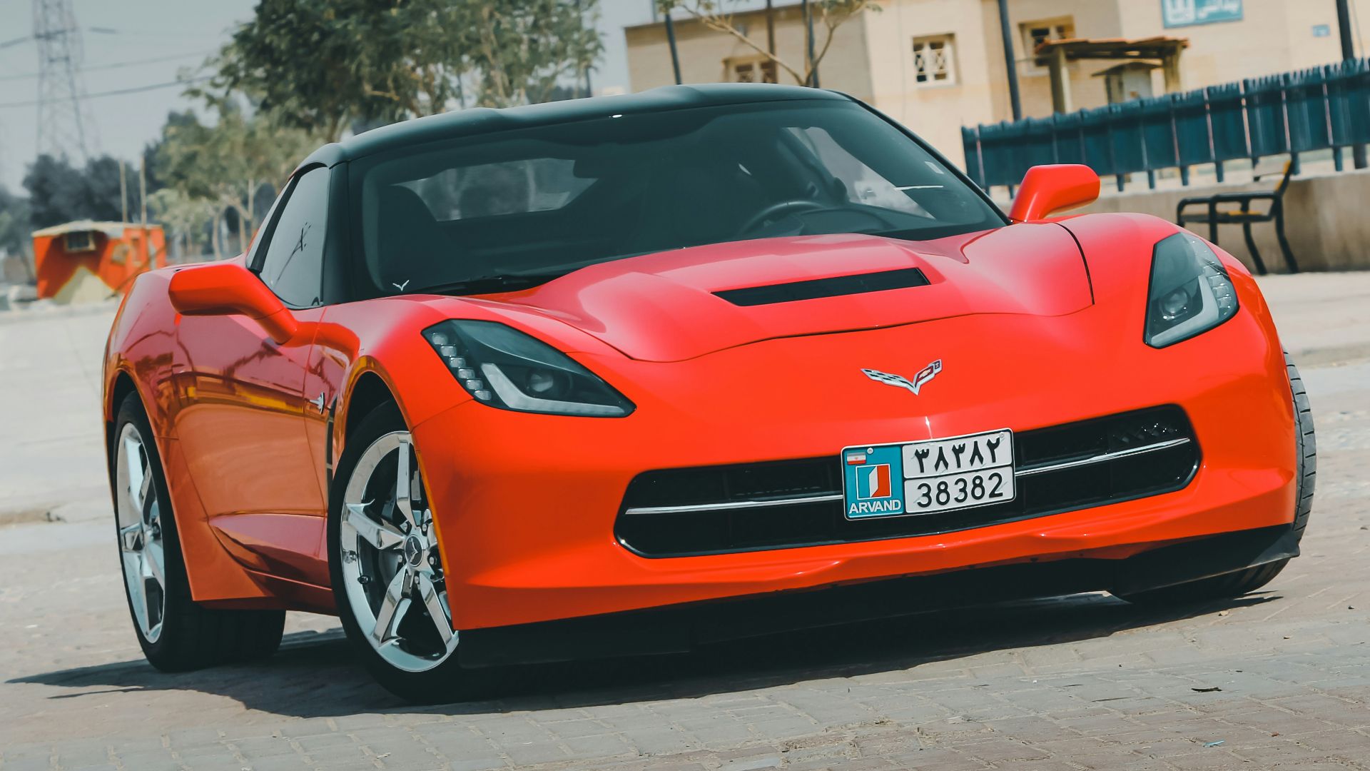 red porsche 911 parked on street during daytime