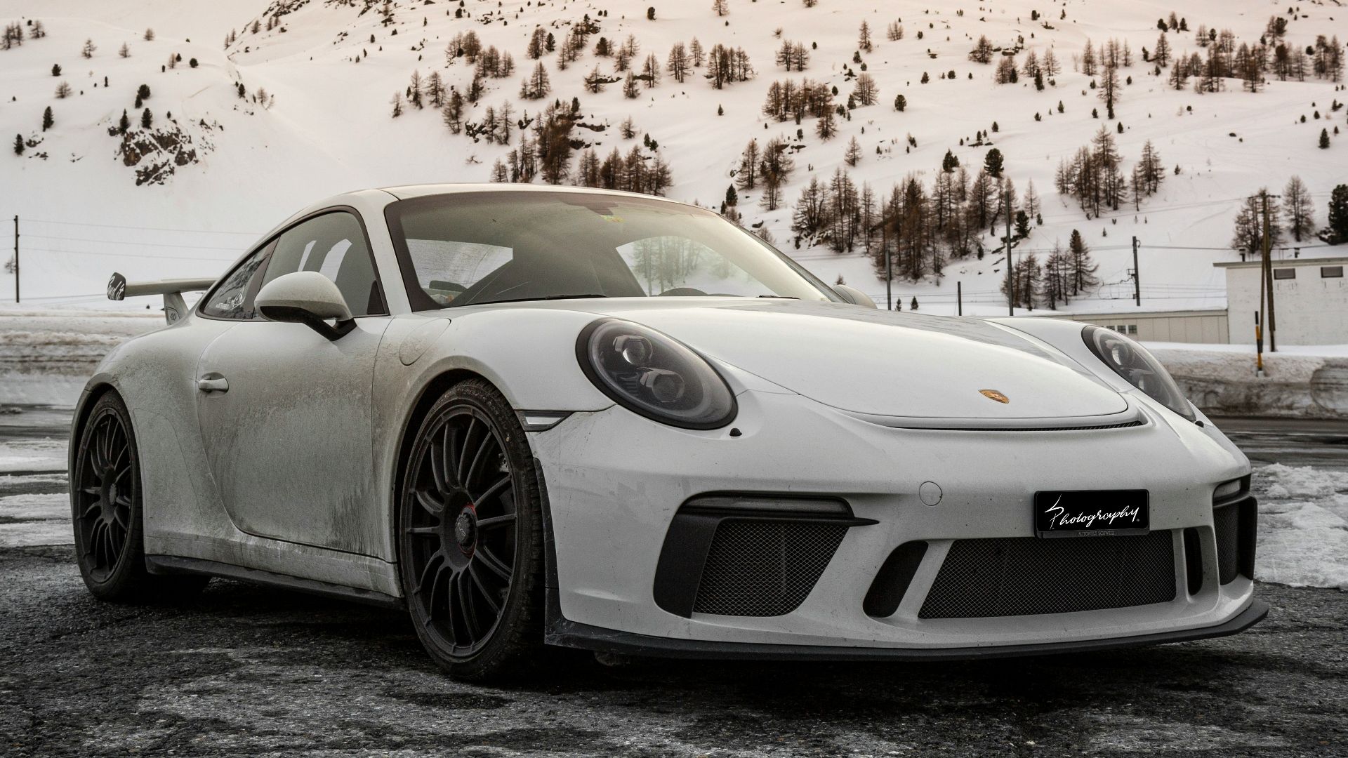 silver porsche 911 on road during daytime