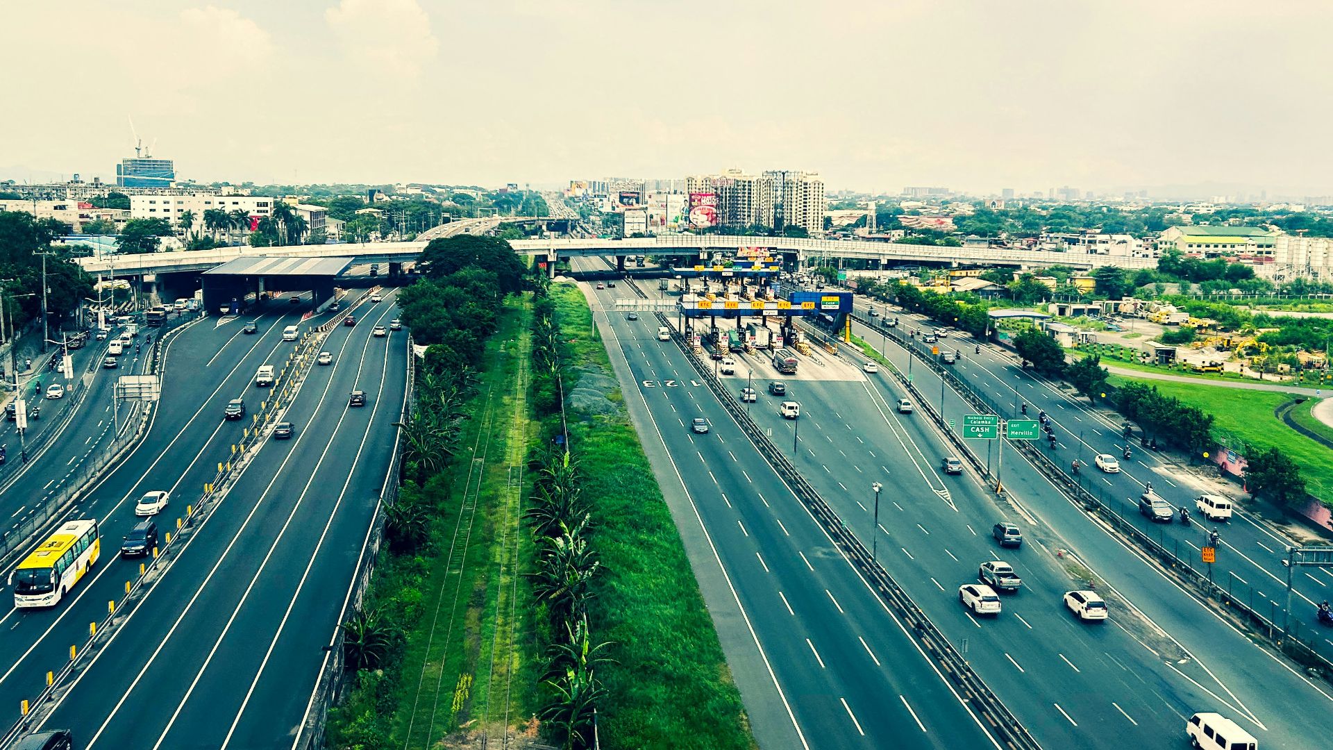 an aerial view of a highway with many cars on it