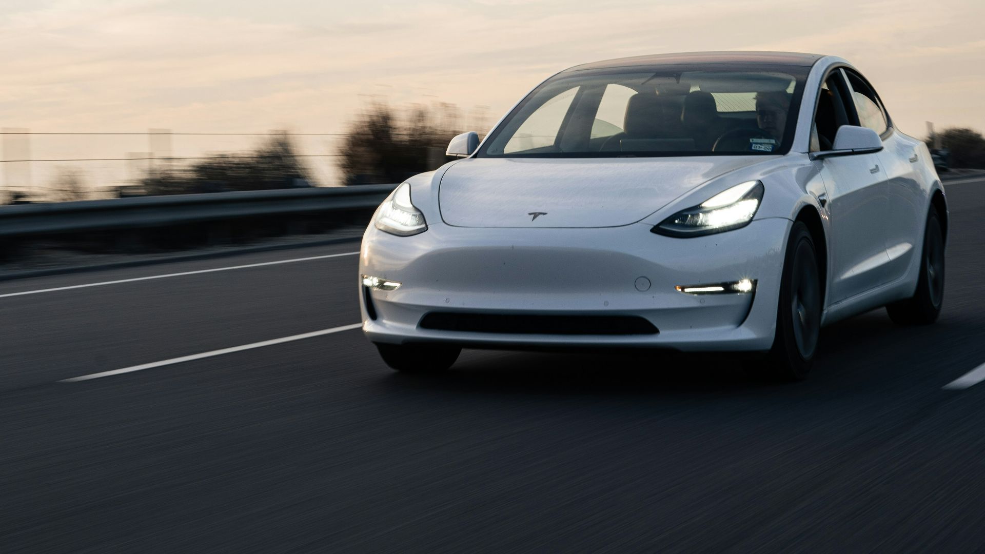 white bmw m 3 on road