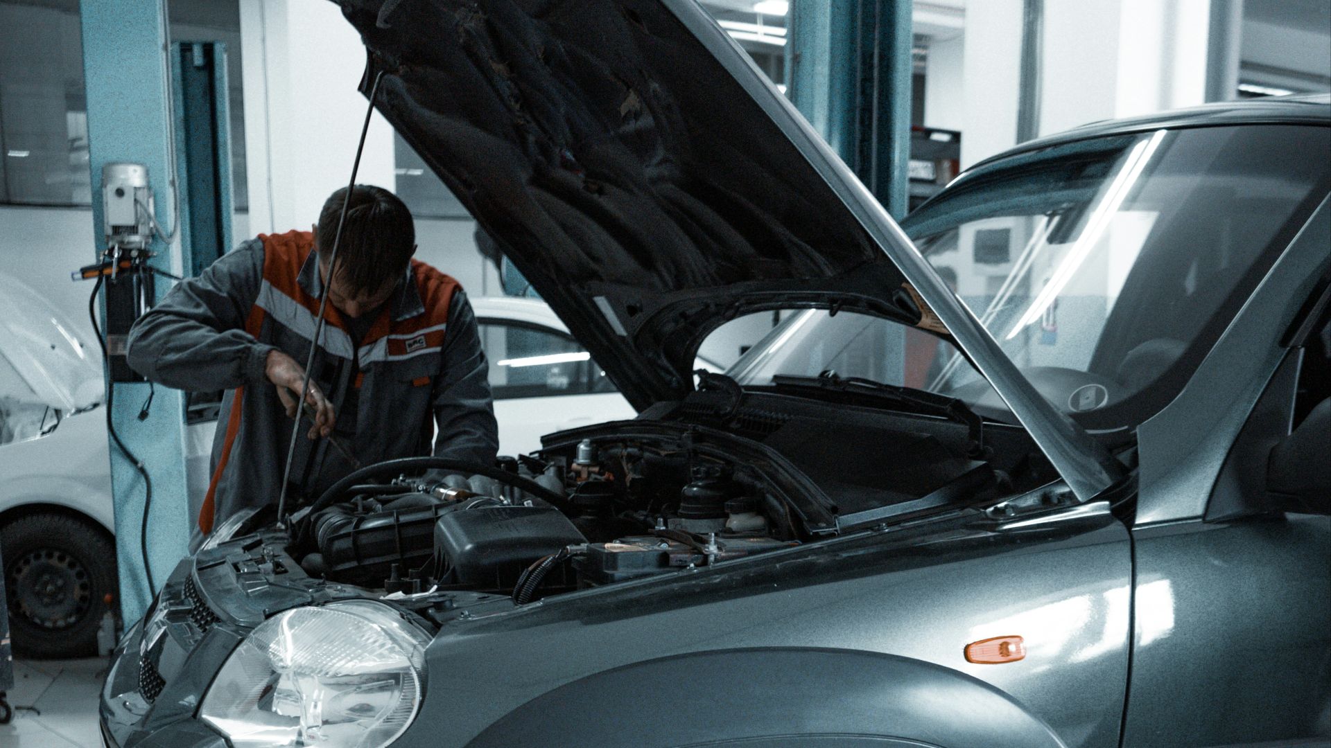 black suv in a garage