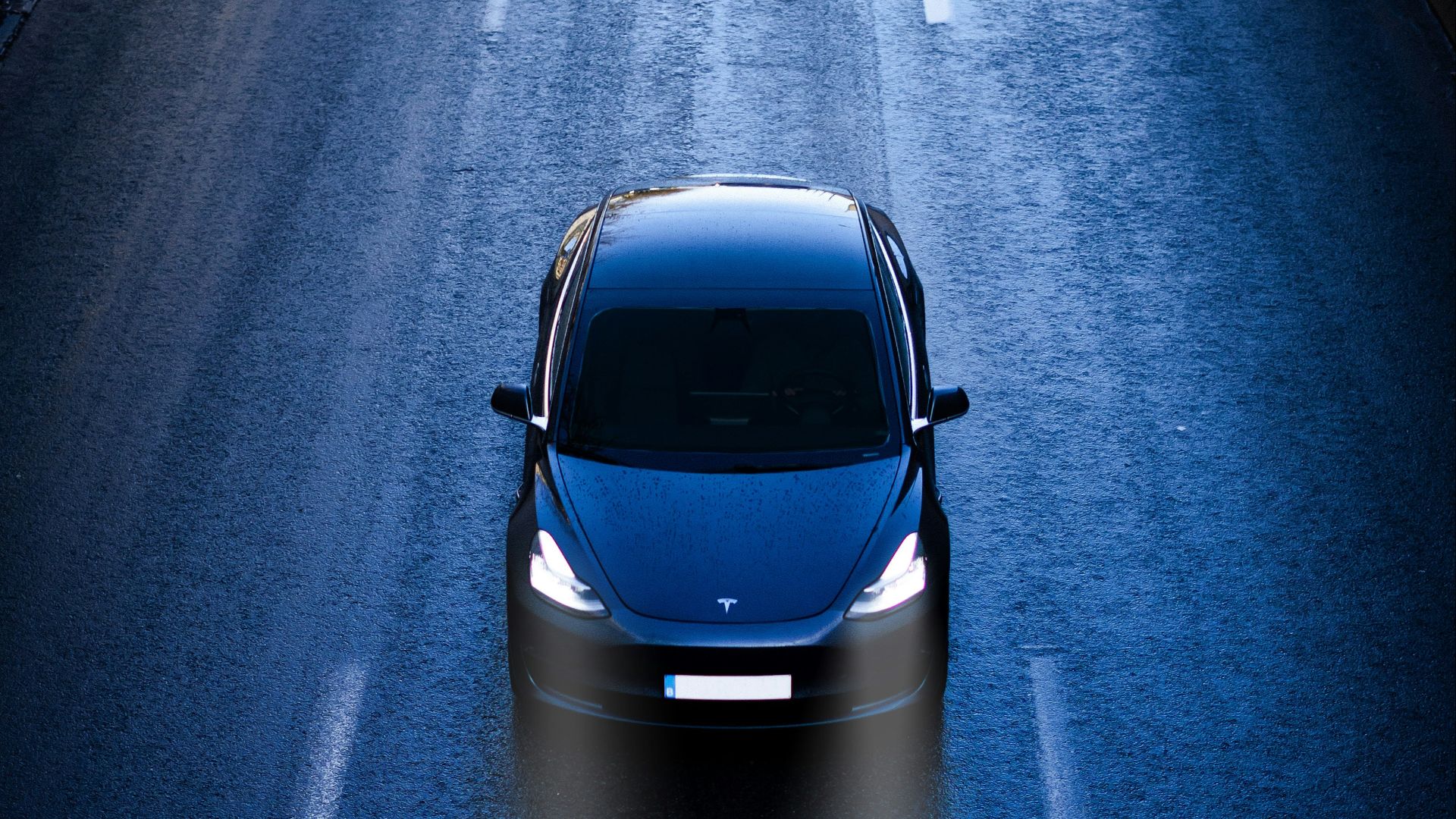 blue car on road during daytime